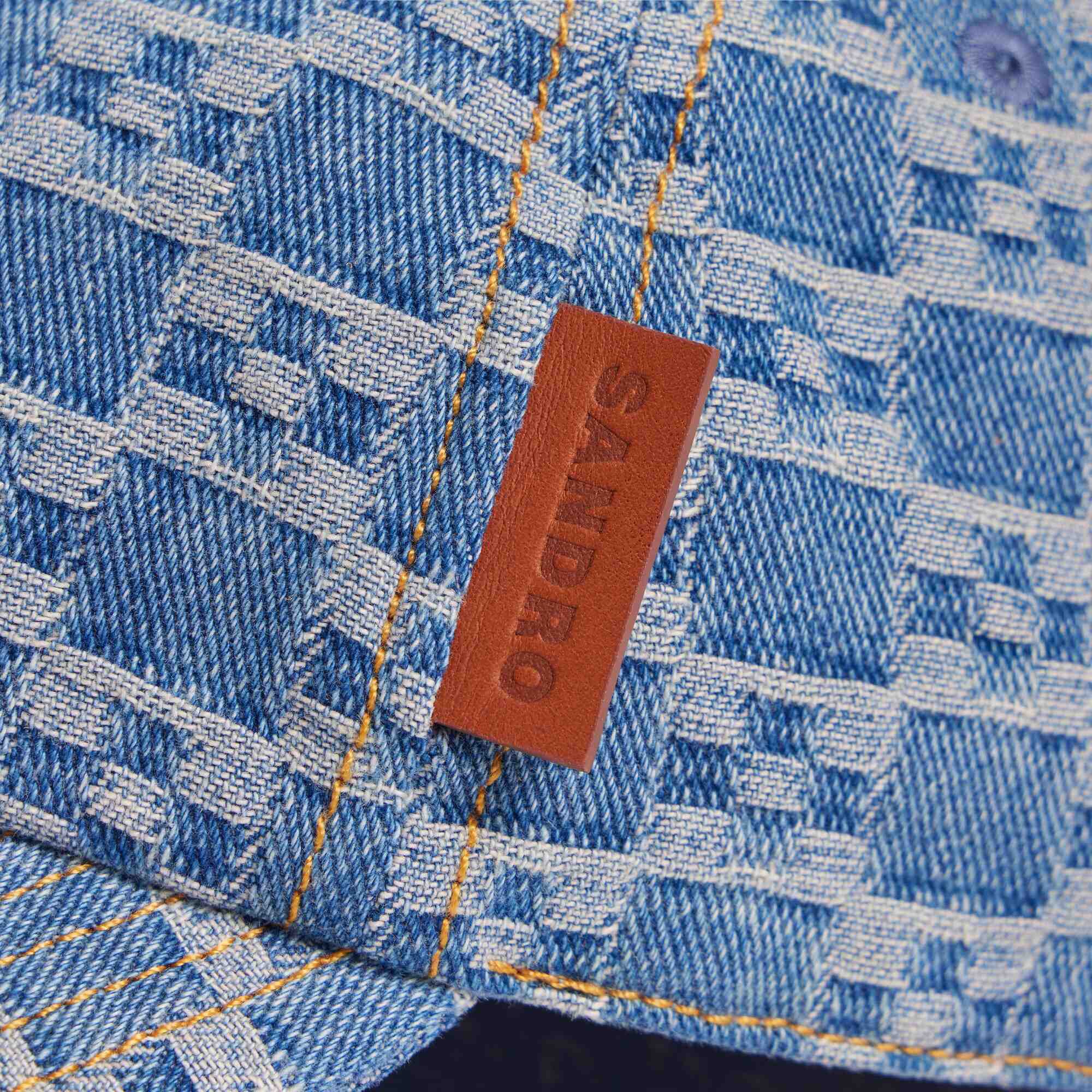 Cappellino in denim motivo cross