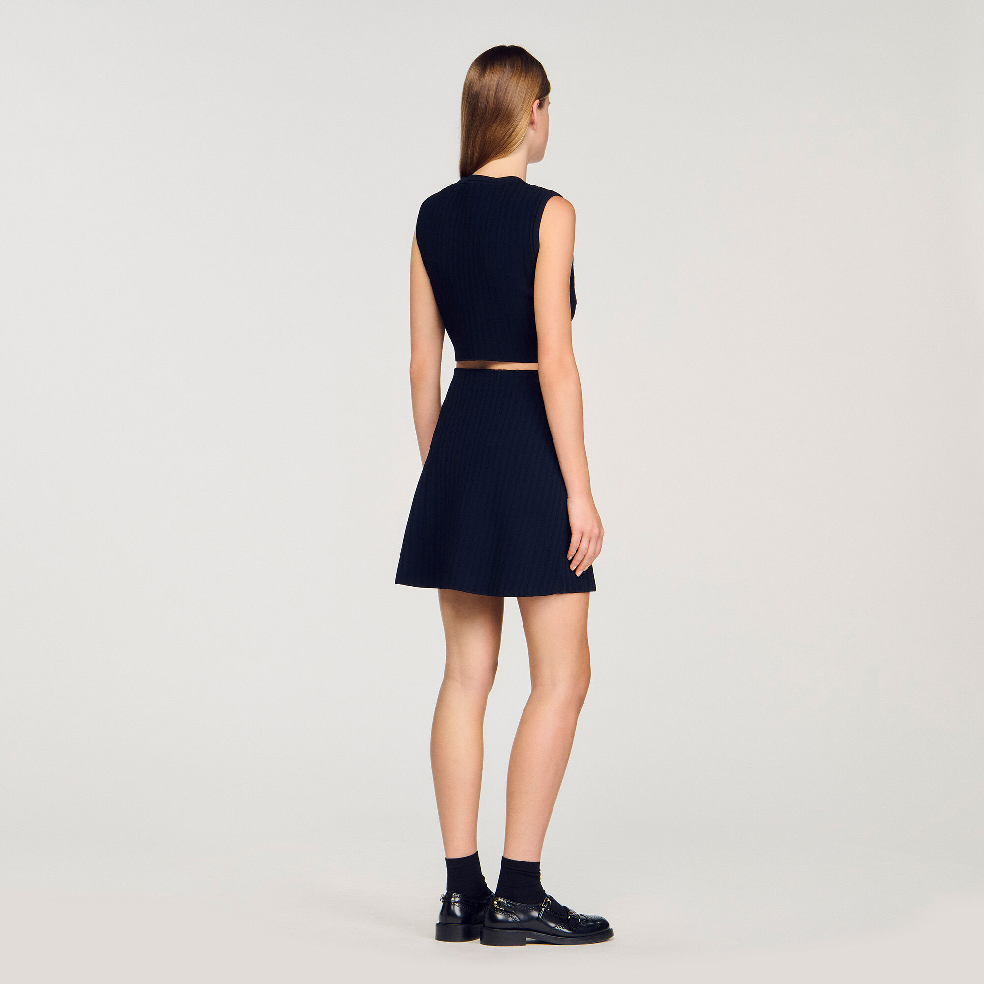 Top in maglia e denim