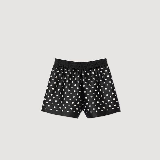 Shorts con pallini decorativi