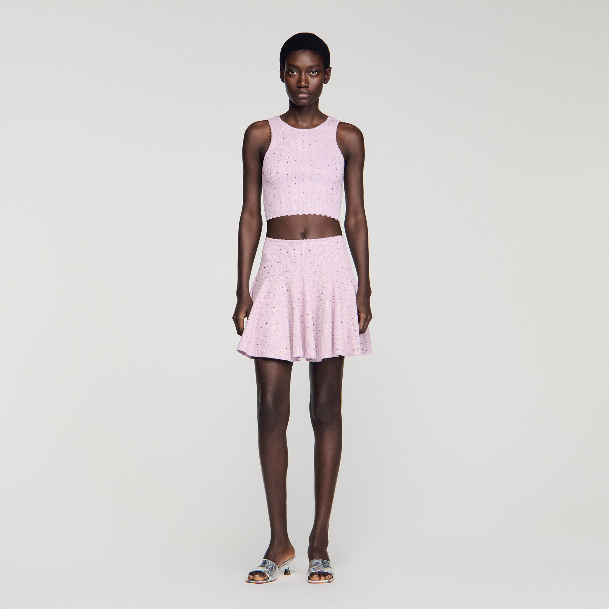 Gonna corta in maglia glitterata