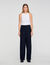 Pantaloni fluidi con rivetti