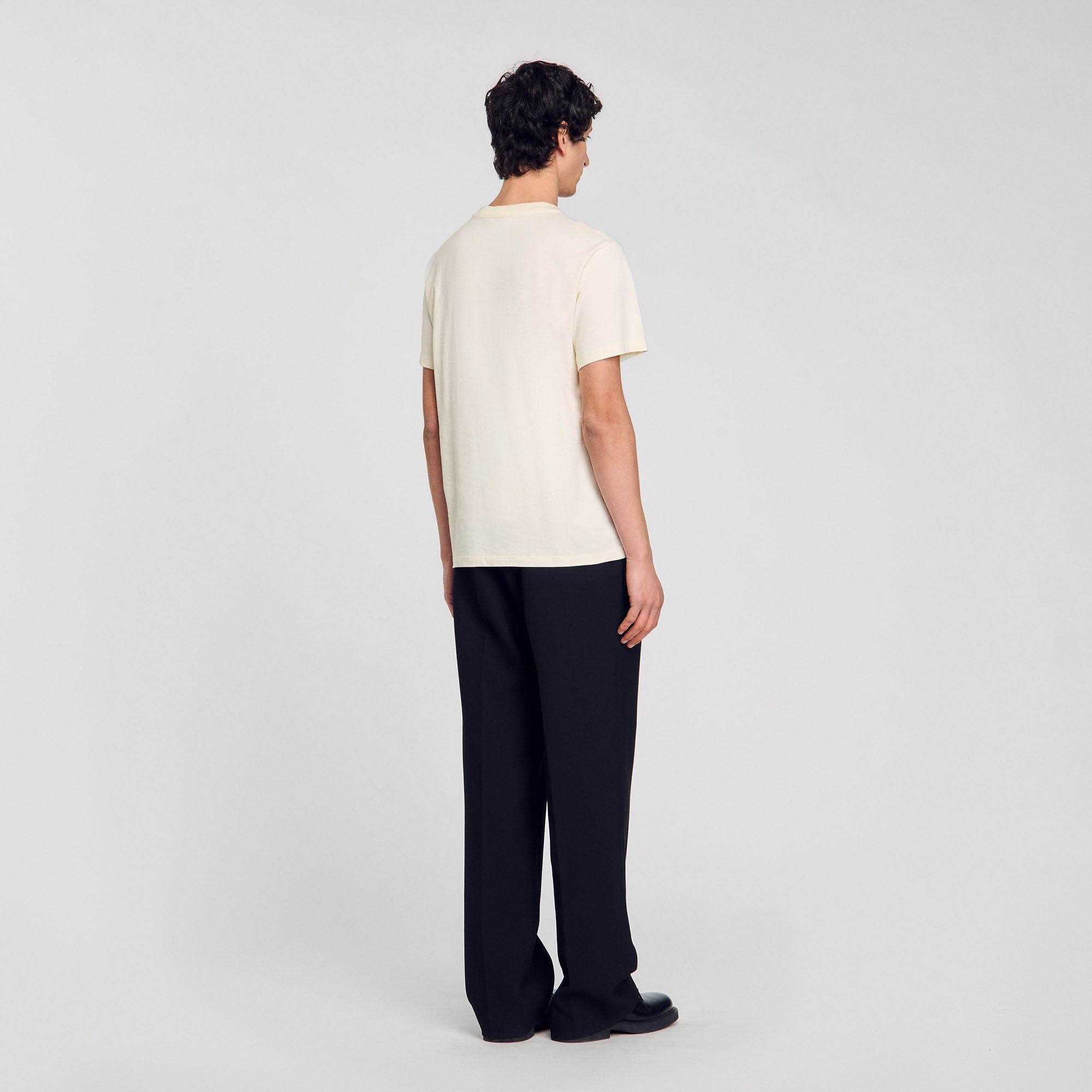 T-shirt con dettaglio a fiore