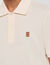 Polo con logo in pelle