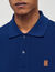Polo con logo in pelle