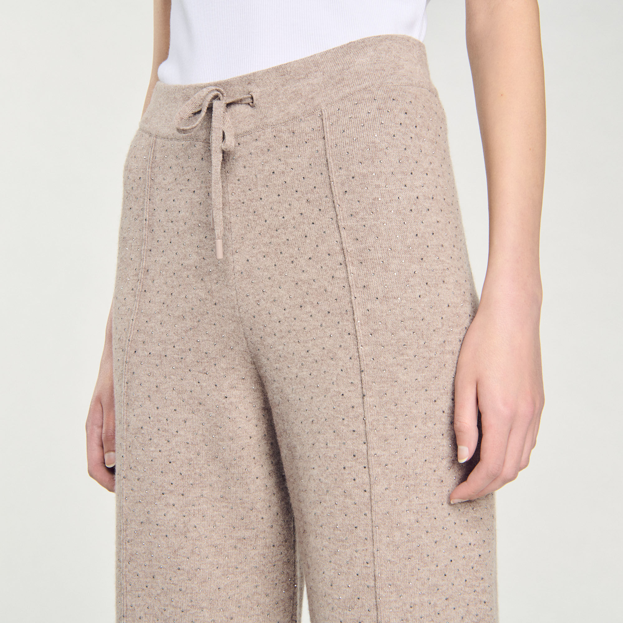 Pantaloni glitterati in maglia