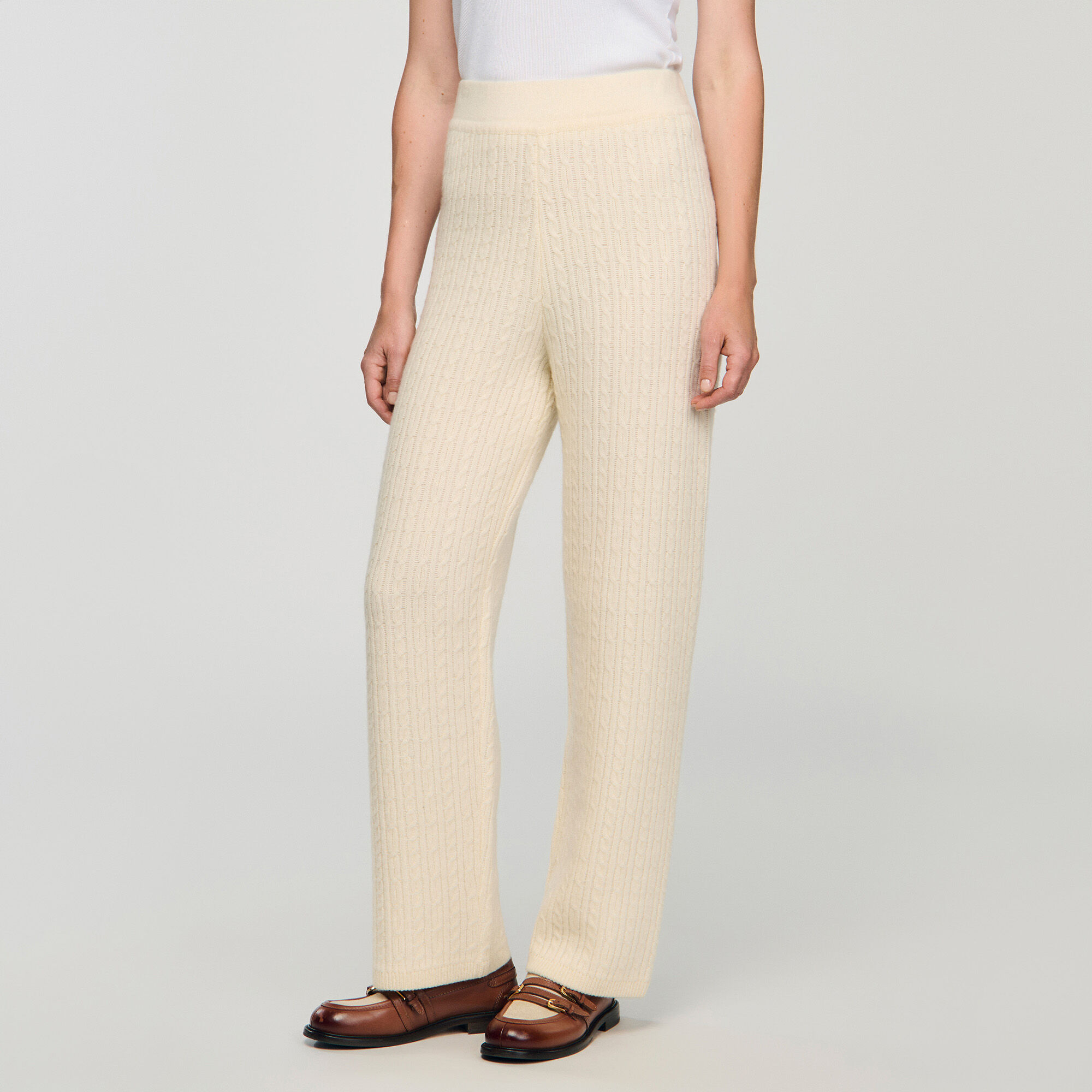 Pantaloni in maglia a trecce