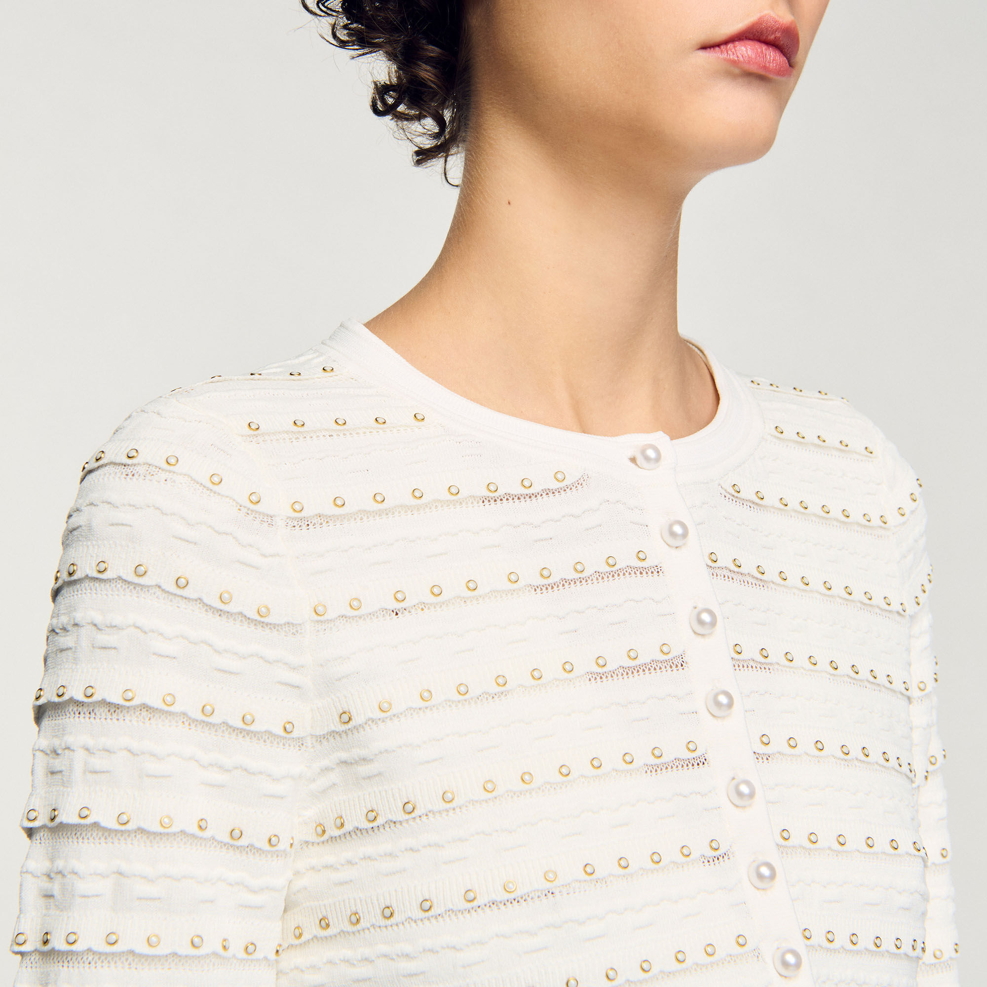 Cardigan corto con perline