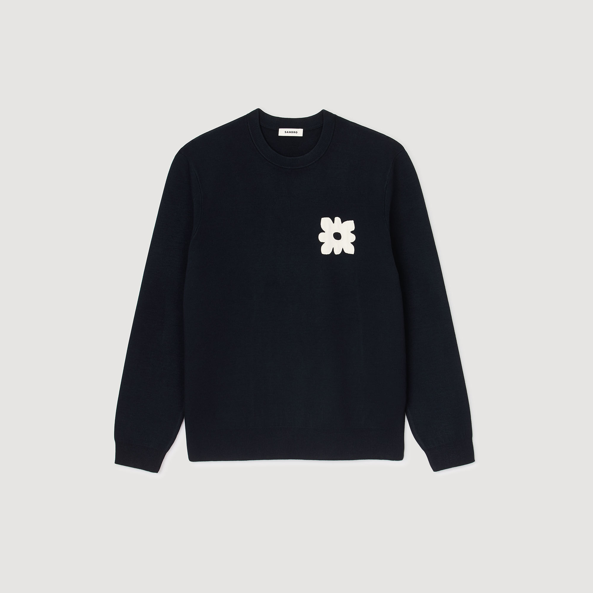 Maglione con dettaglio a fiore