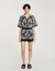 Shorts con stampa a fiori