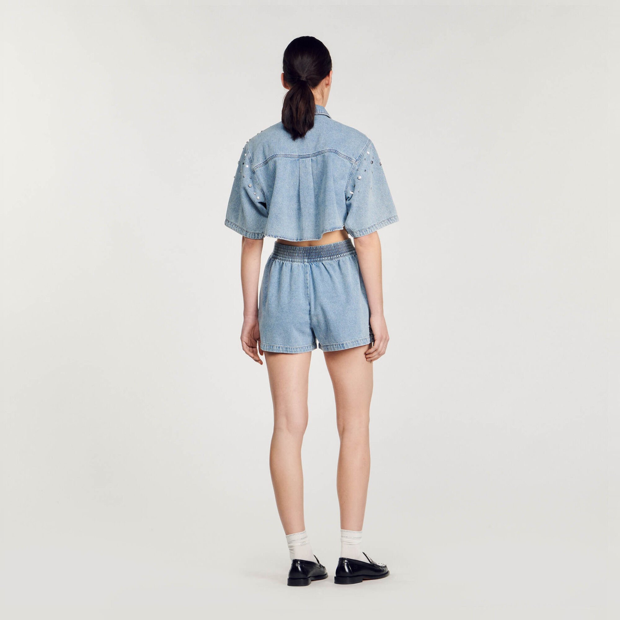 Shorts larghi in denim glitterati