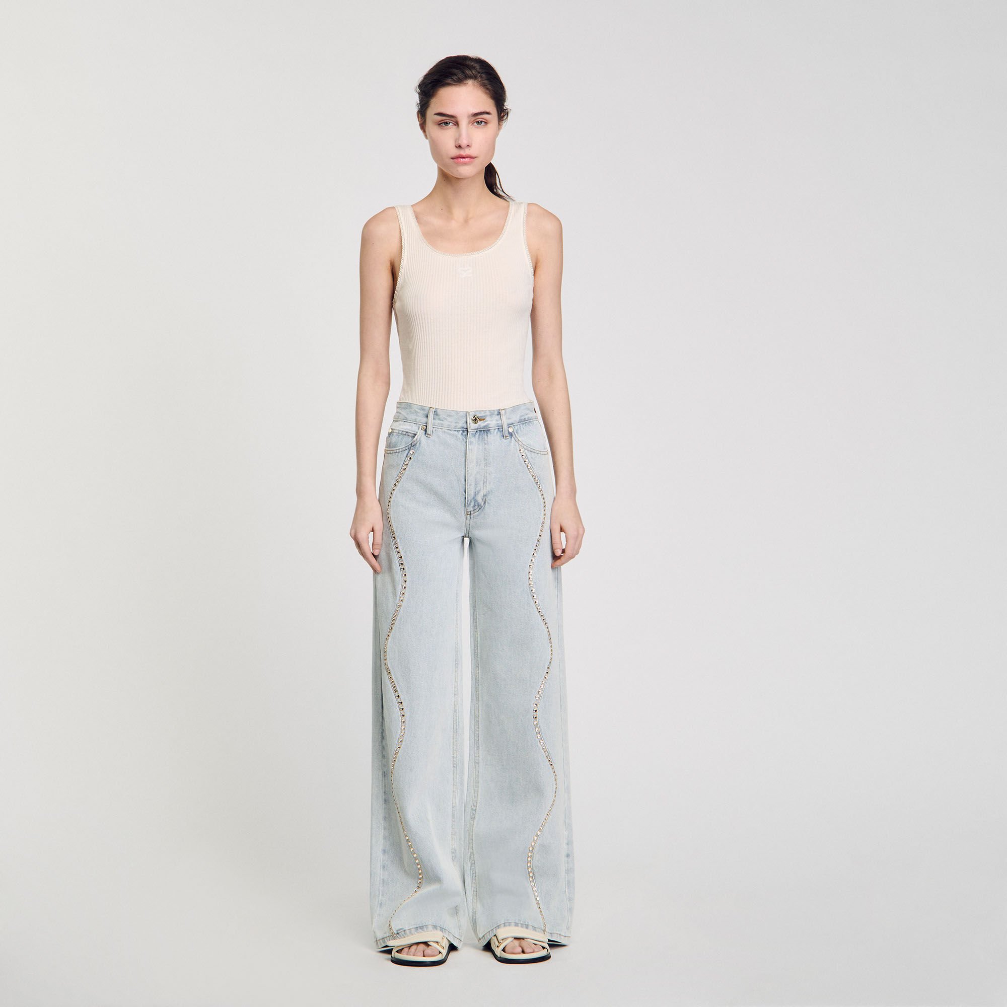 Jeans con fasce glitterate