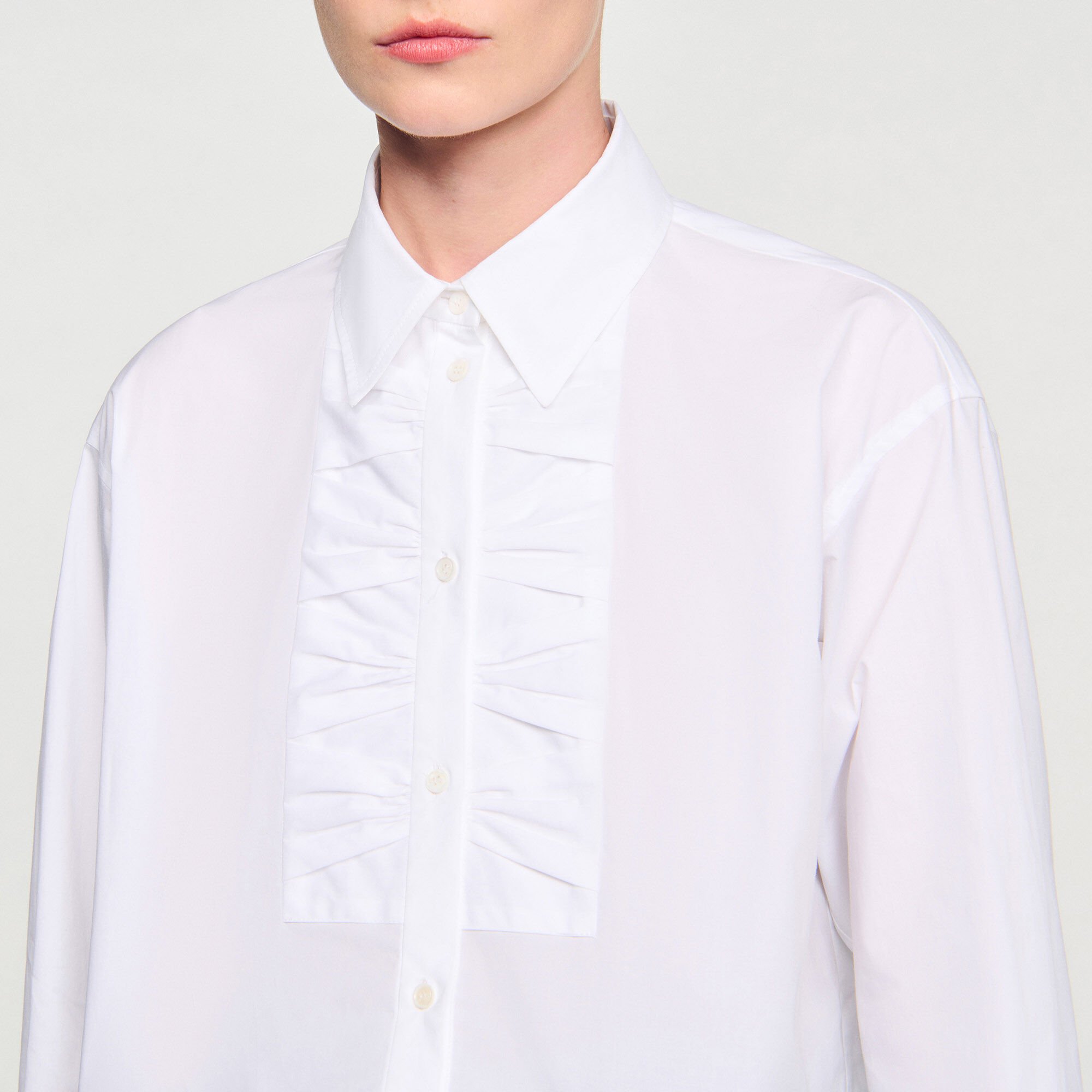 Camicia corta con dettagli nodo