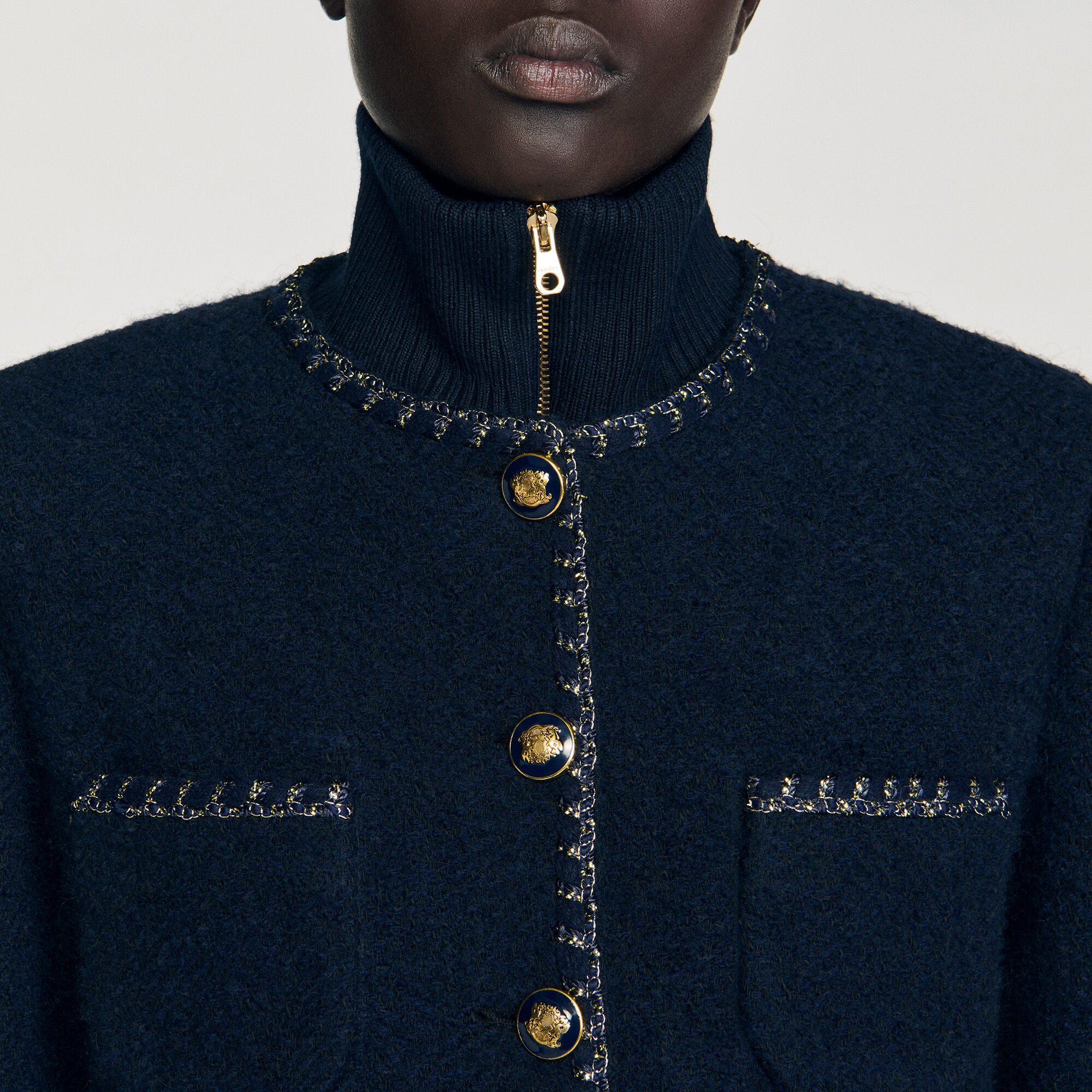 Giacca in tweed con bordi fantasia