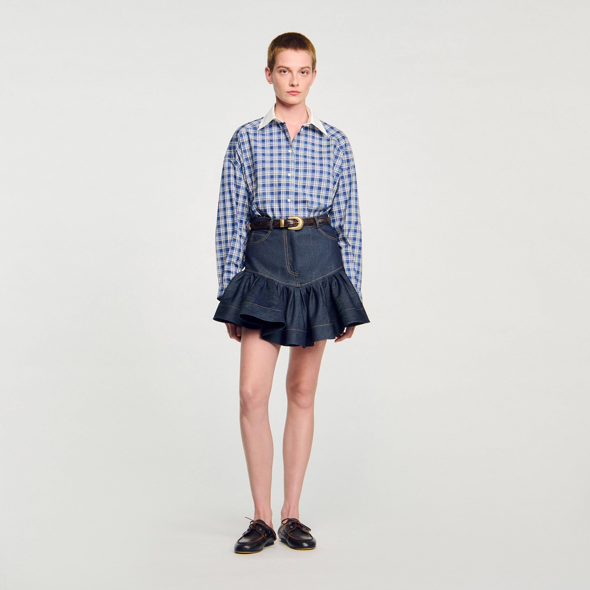 Gonna corta in denim con volant