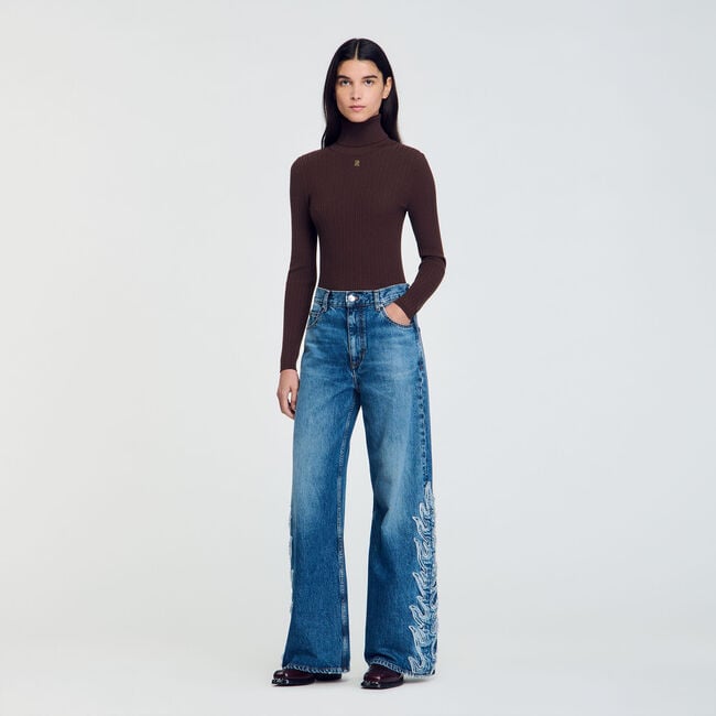 Jeans svasati con fiamme