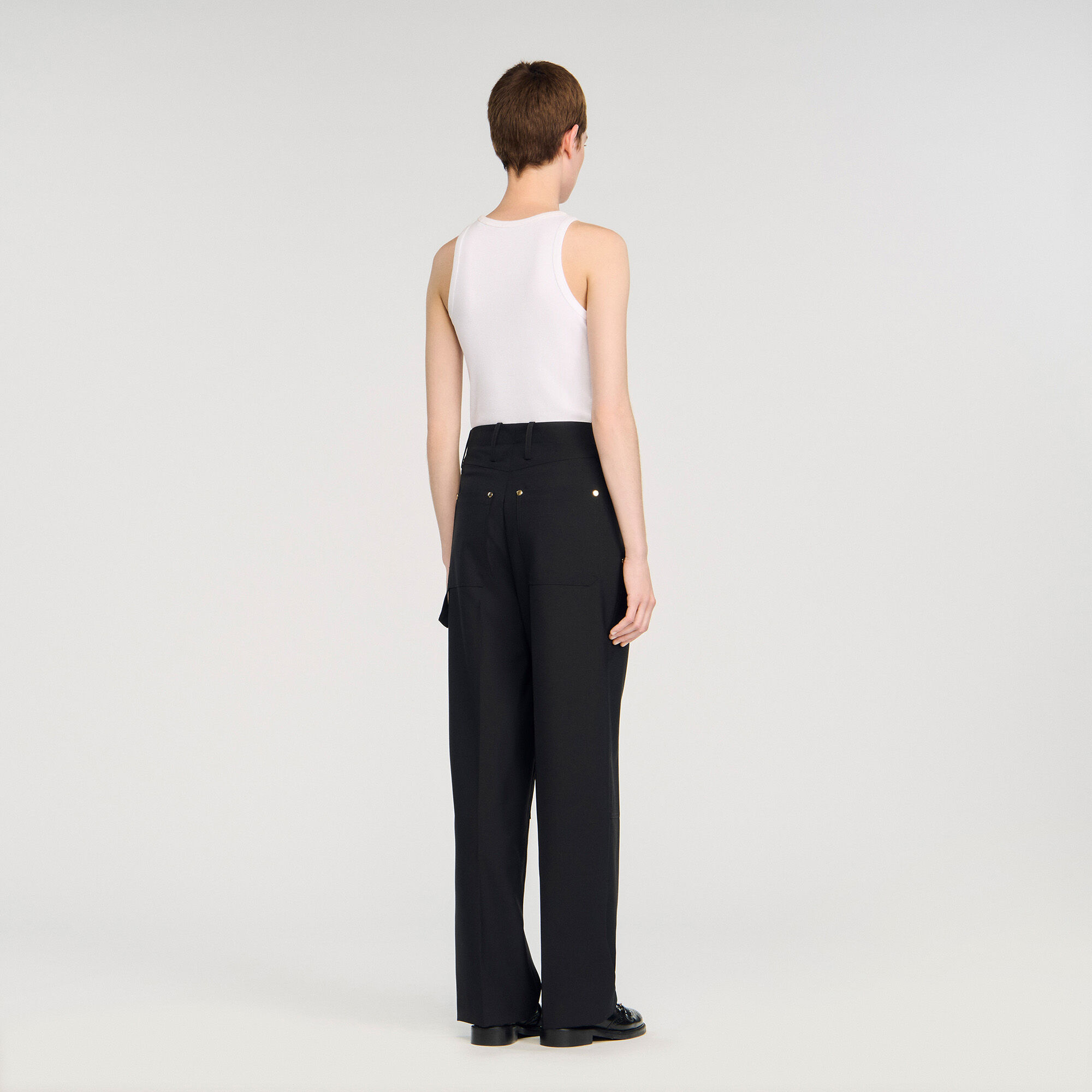 Pantaloni fluidi con rivetti