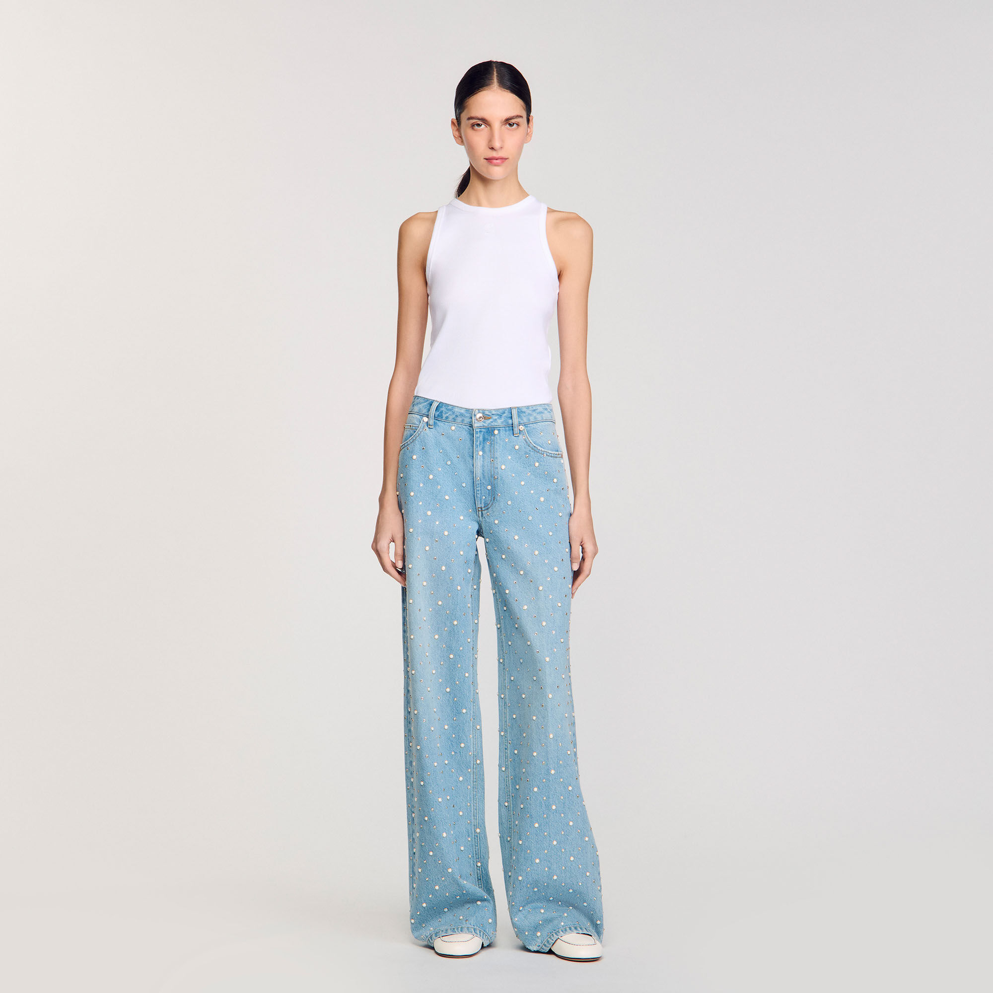 Jeans con strass e perline