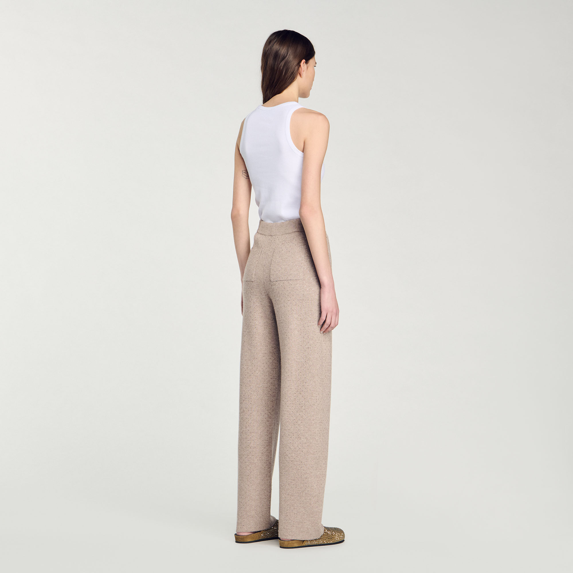 Pantaloni glitterati in maglia