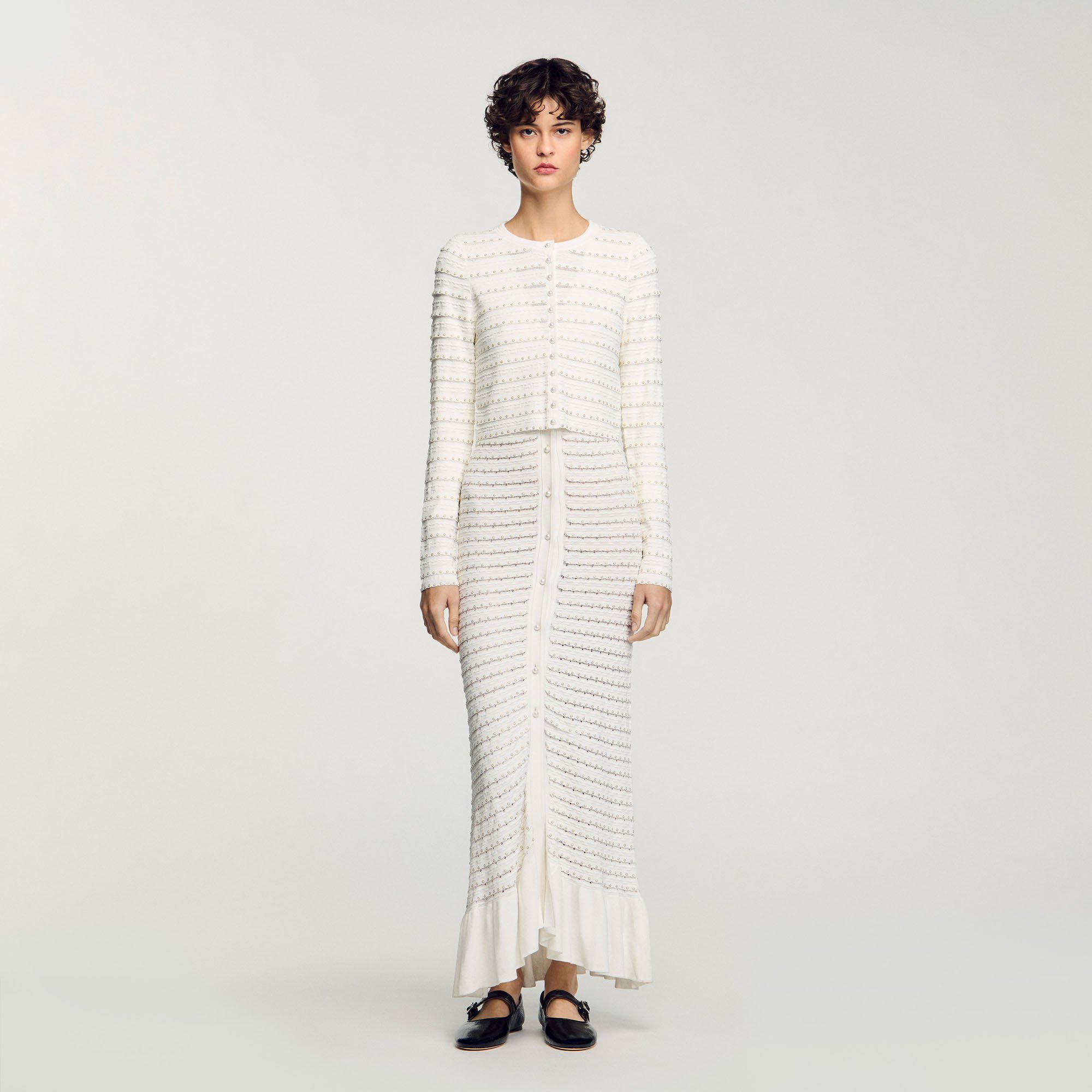 Cardigan corto con perline