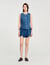 Top in denim decorato con strass