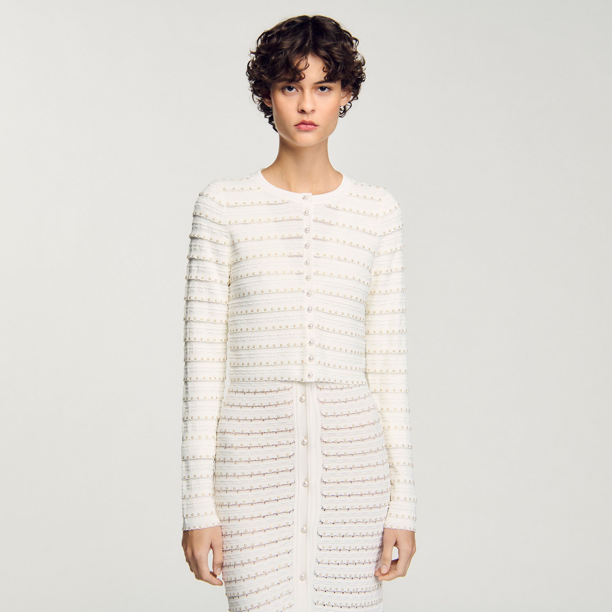 Cardigan corto con perline
