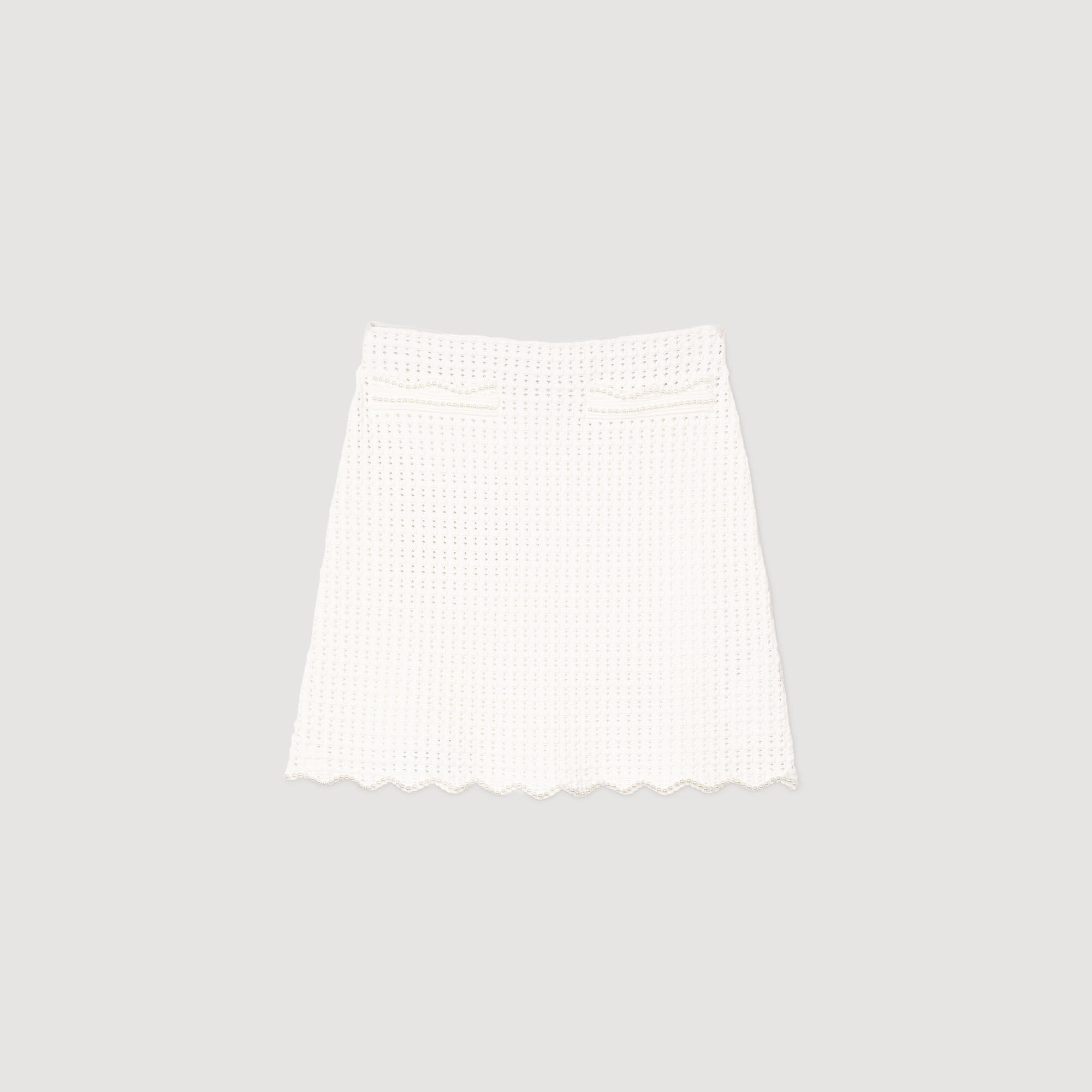 Gonna corta in maglia con perle