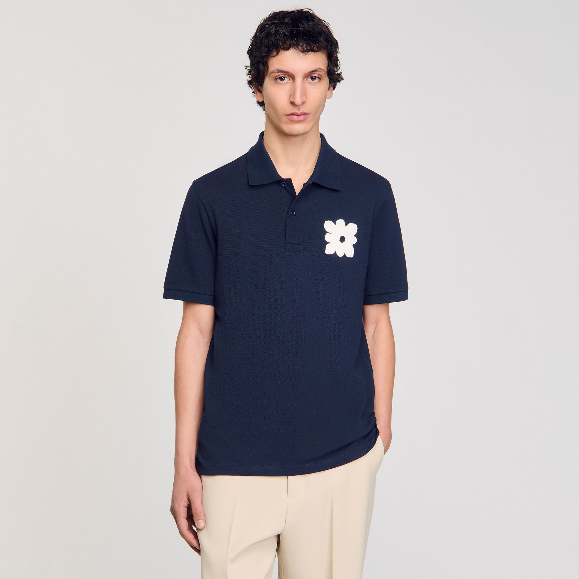 Polo con inserto a fiore