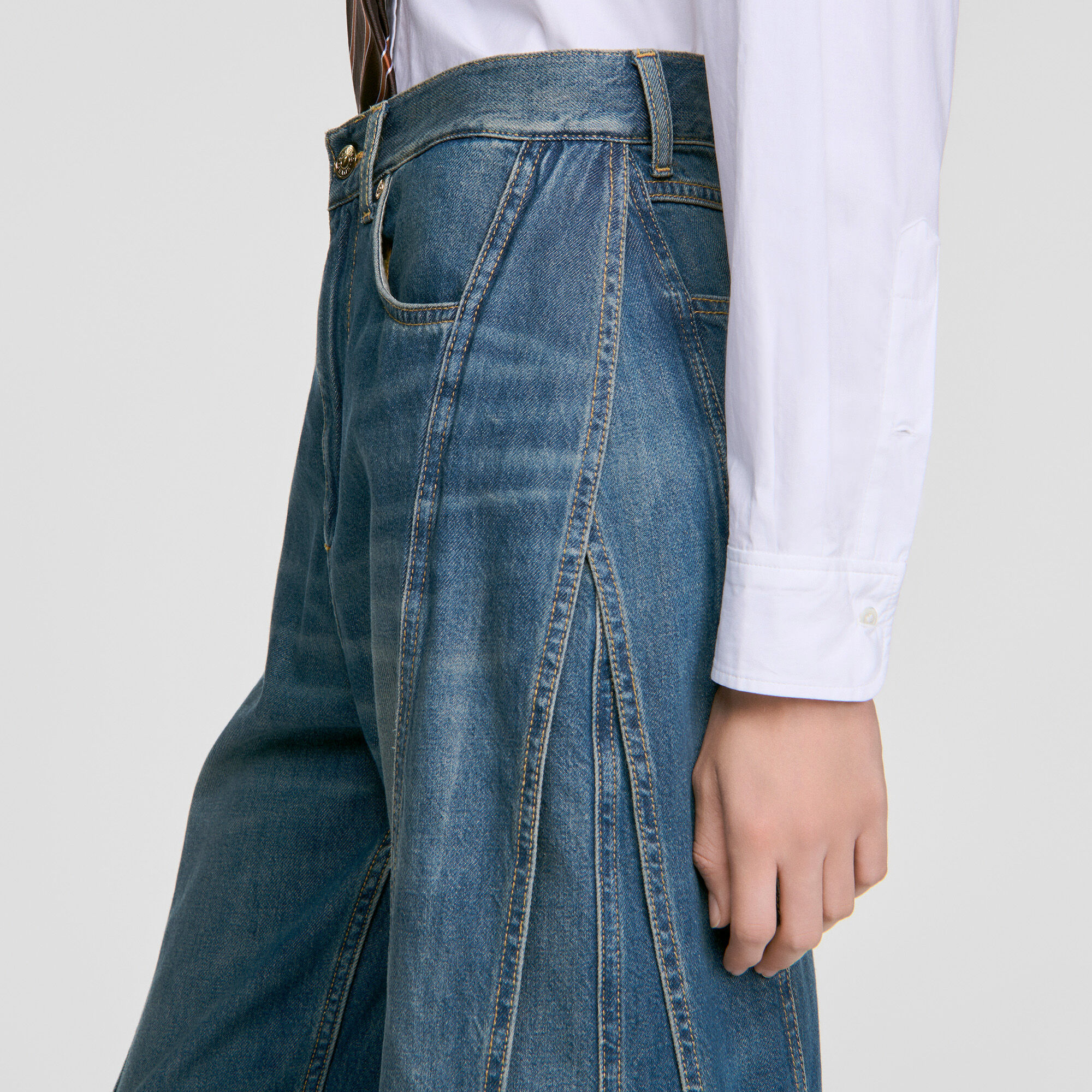 Jeans larghi con tagli impunturati - Donna | Sandro