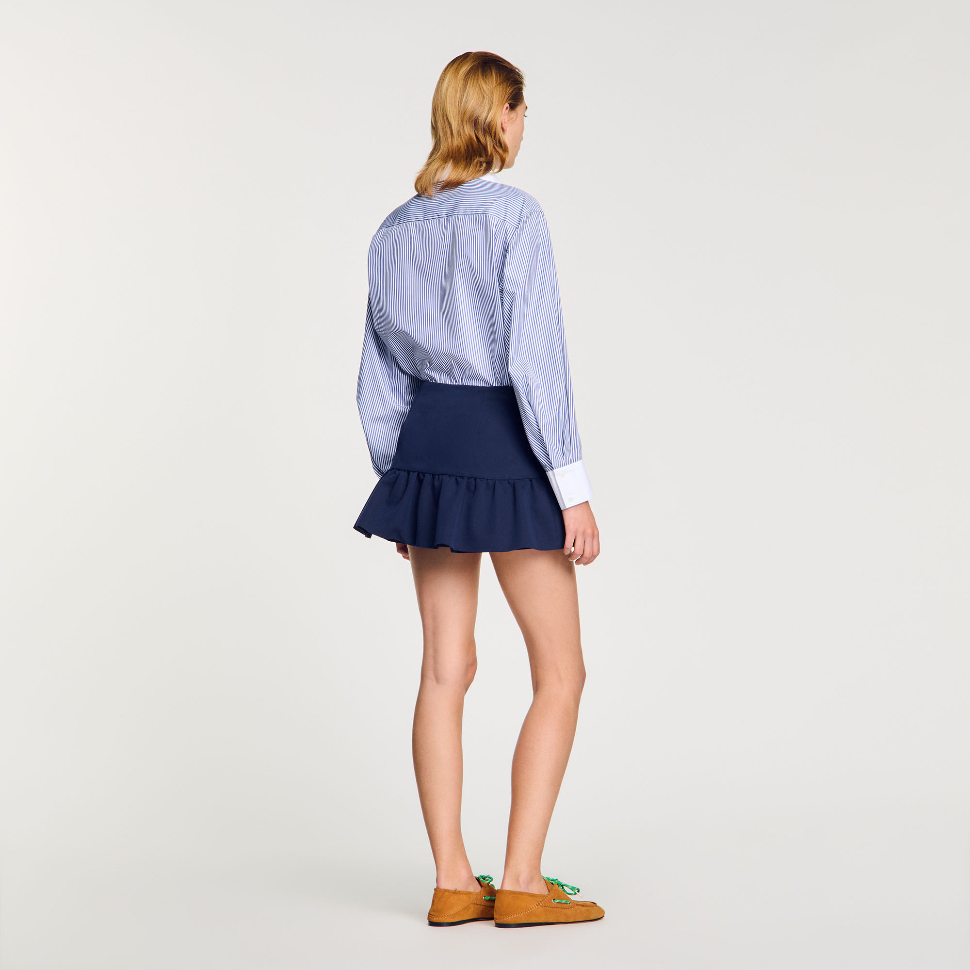 Shorts con volant