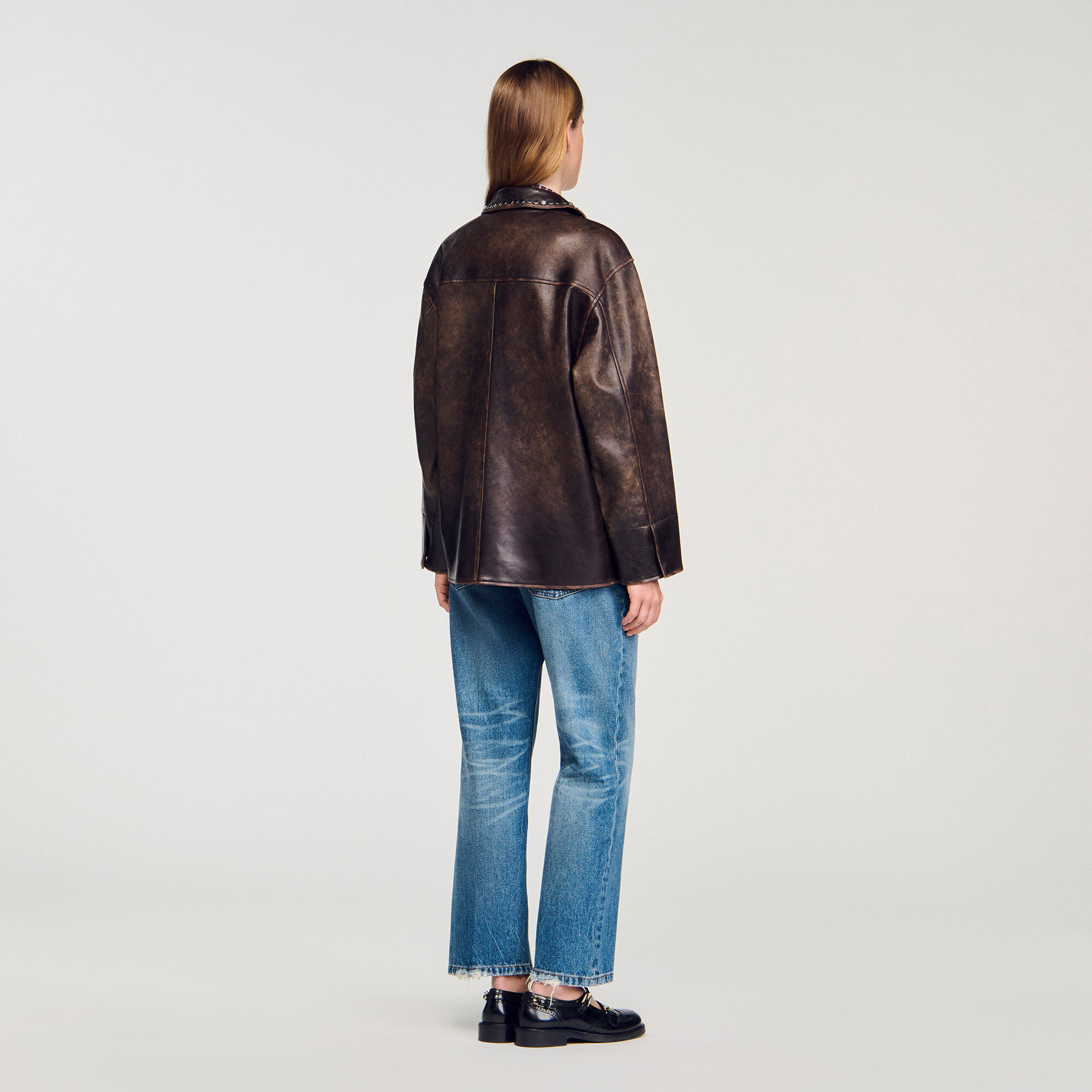 Giubbotto oversize borchiato in pelle