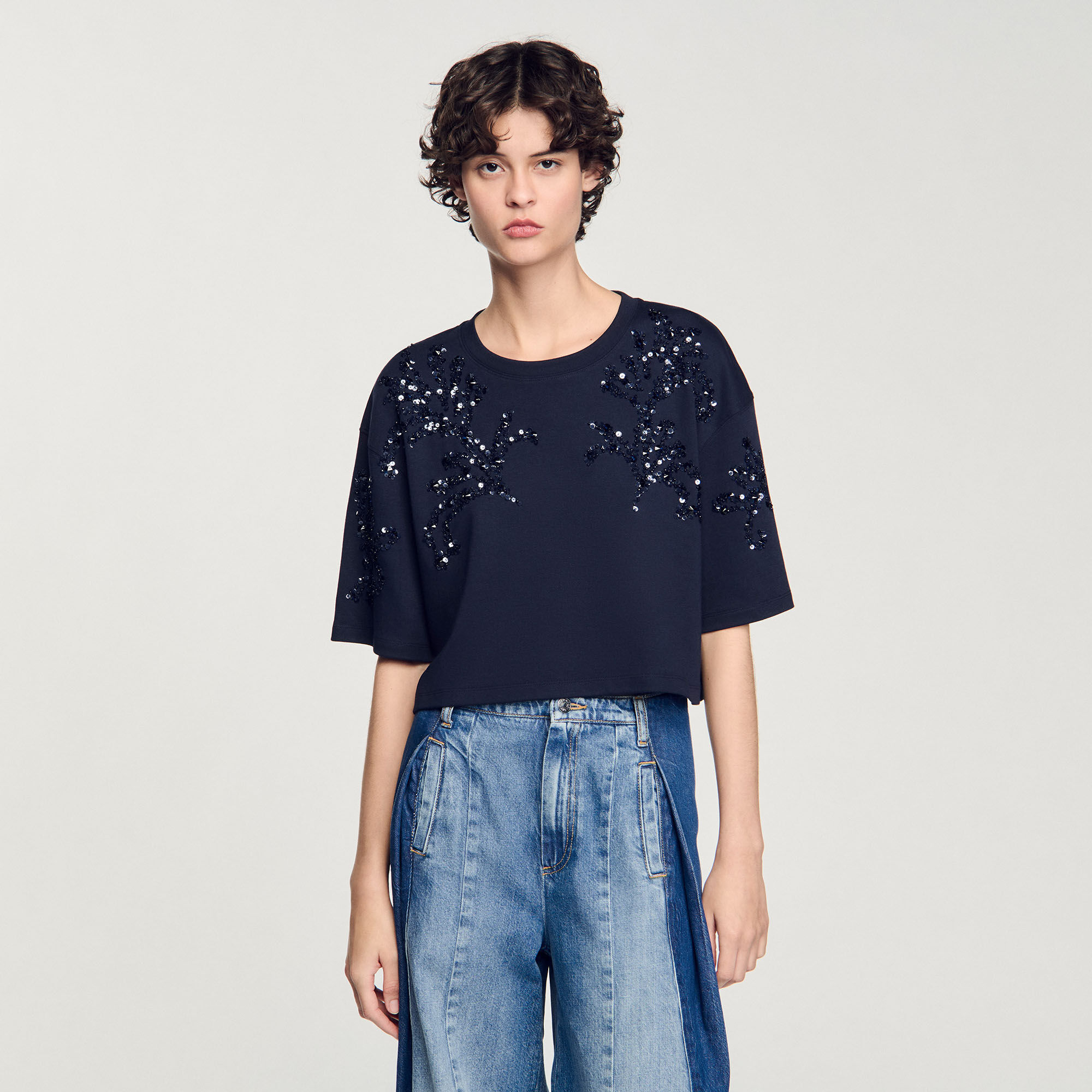 T-shirt con dettagli a perline