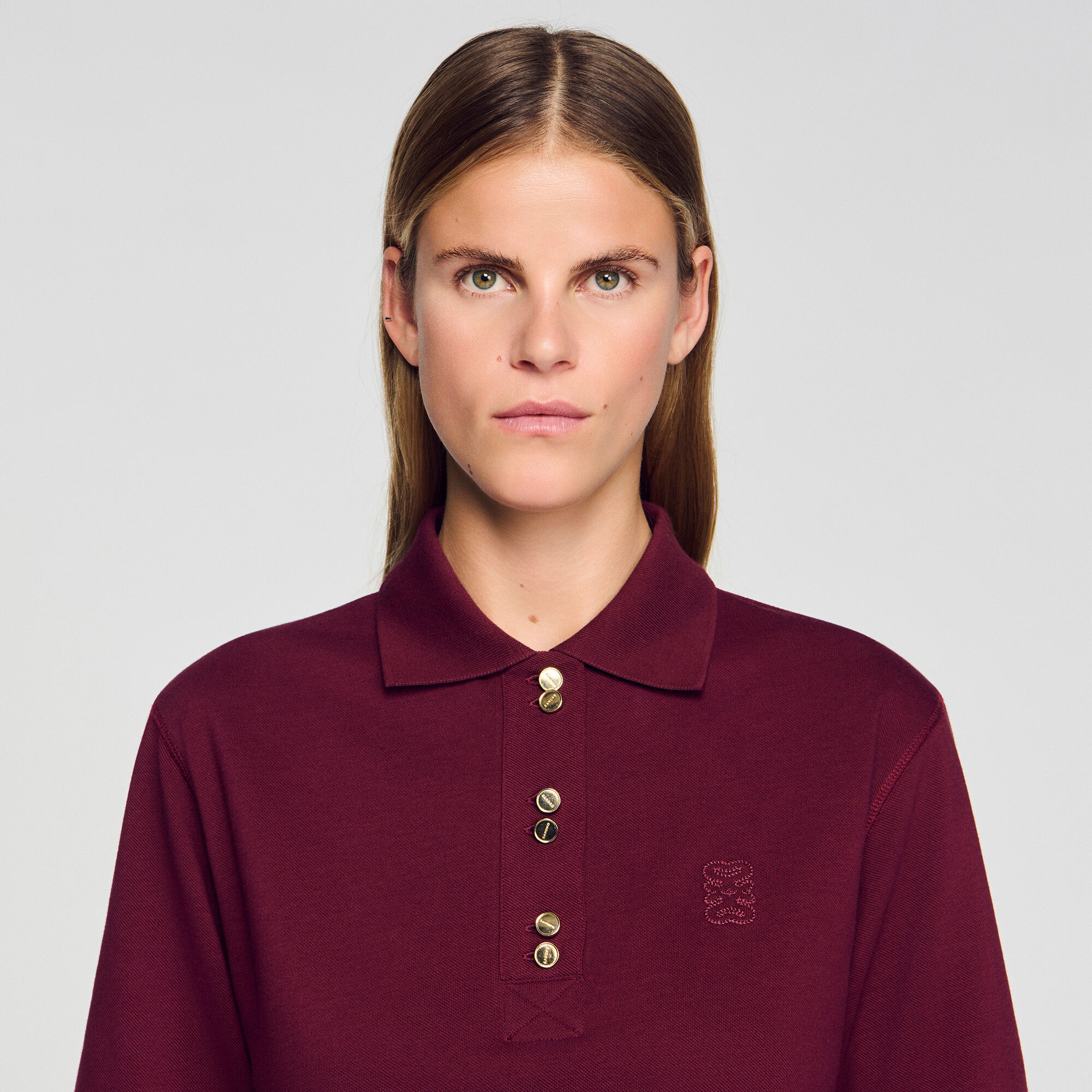 Polo con bottoni fantasia