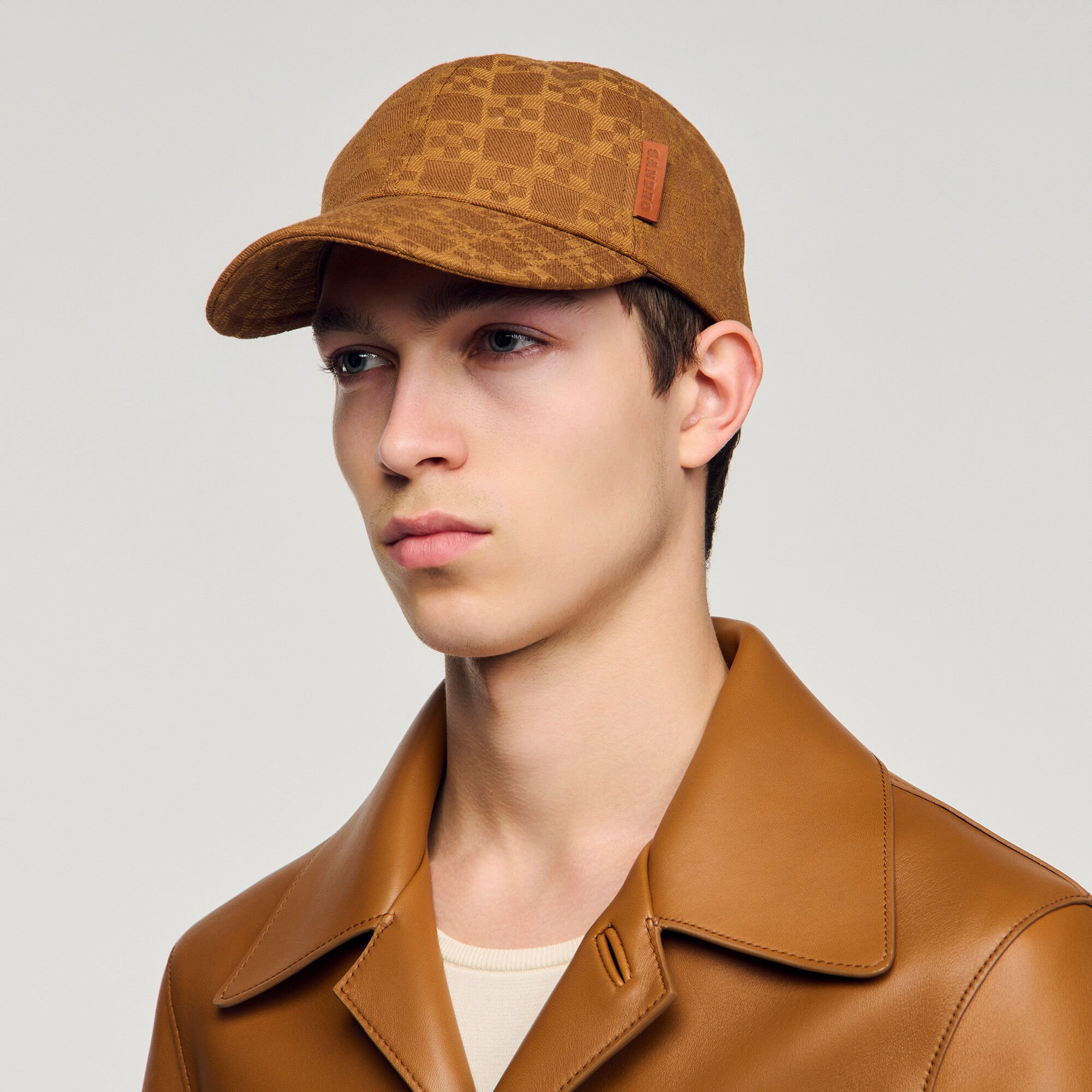 Cappellino in denim motivo cross