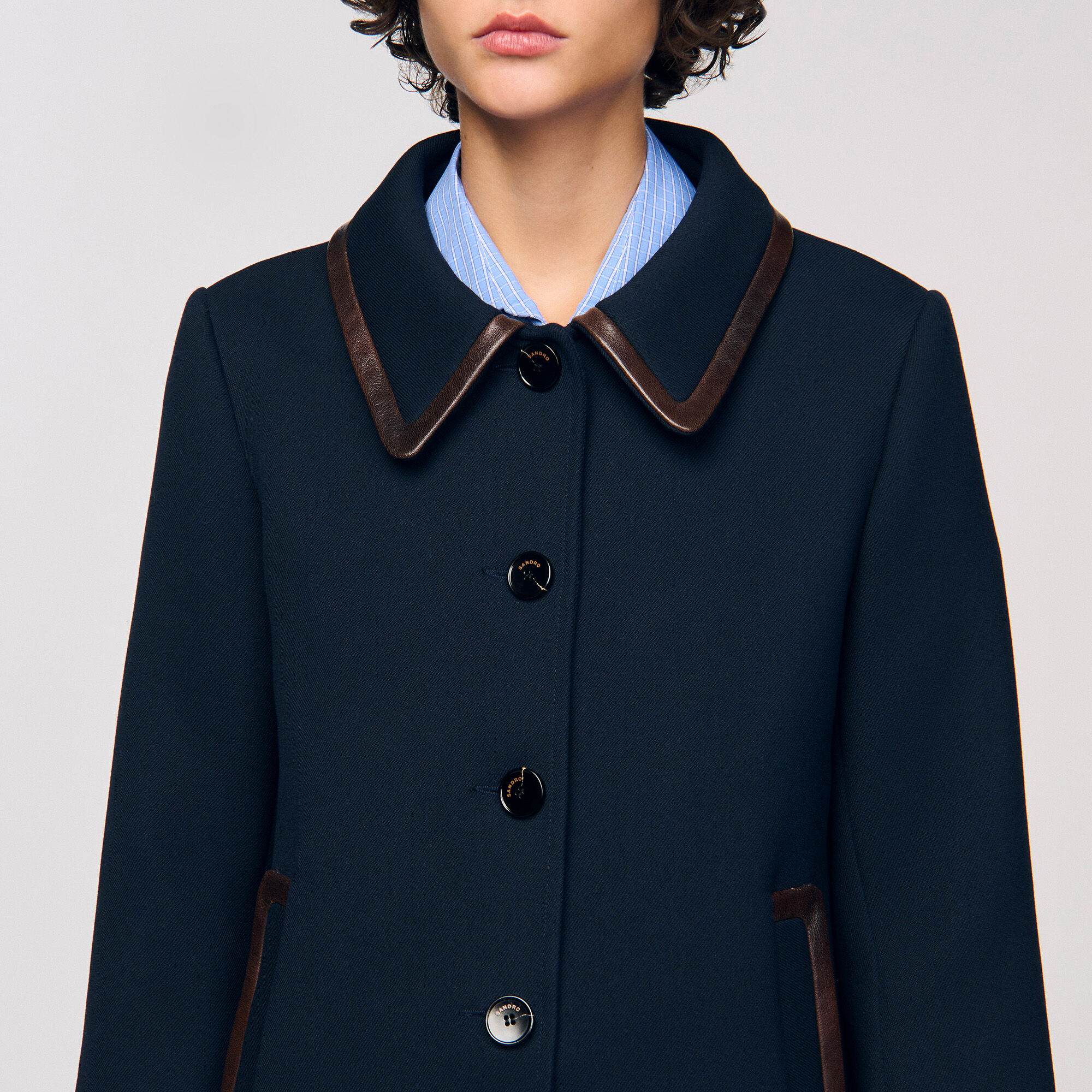 Cappotto con fasce in pelle