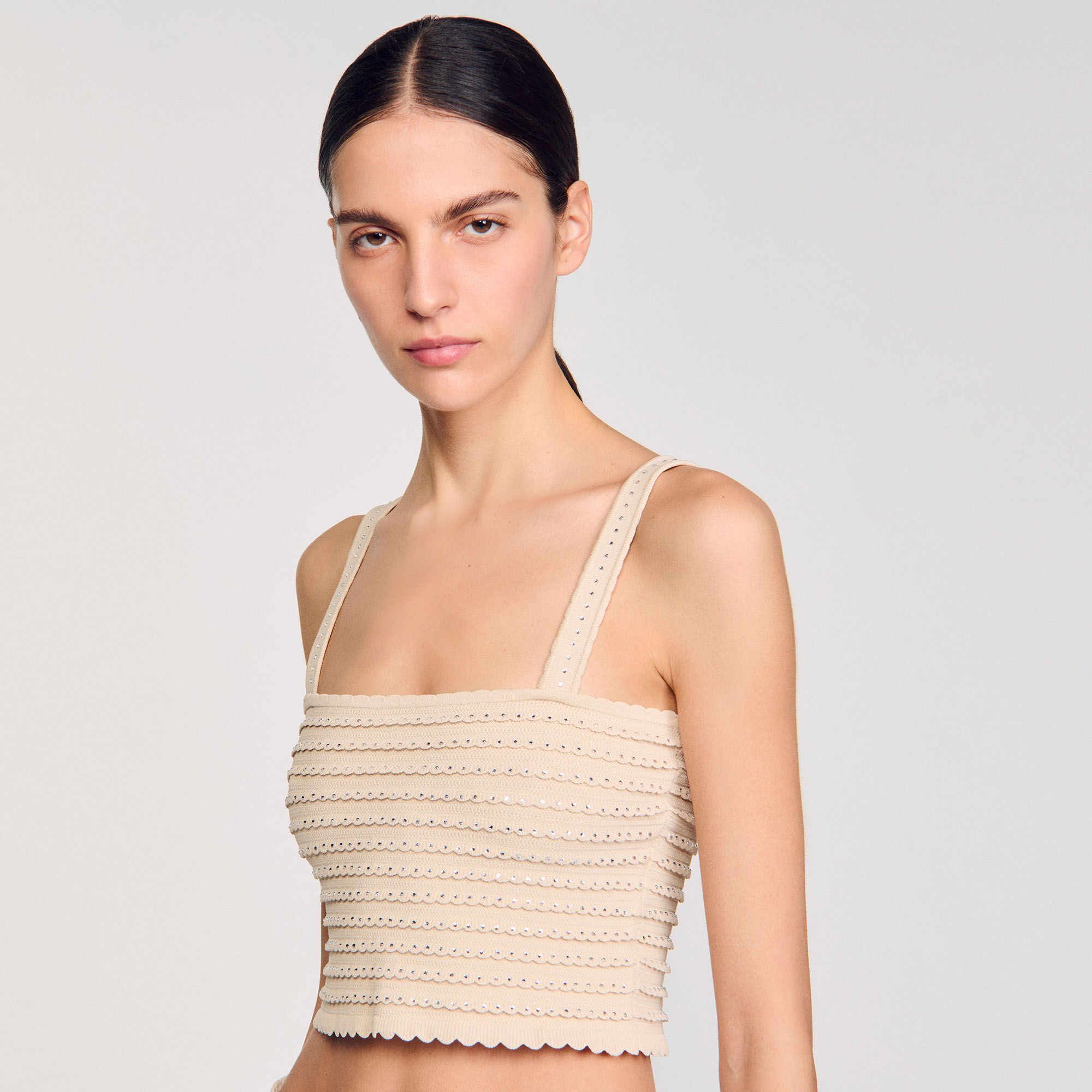 Top corto in maglia glitterata