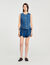 Top in denim decorato con strass