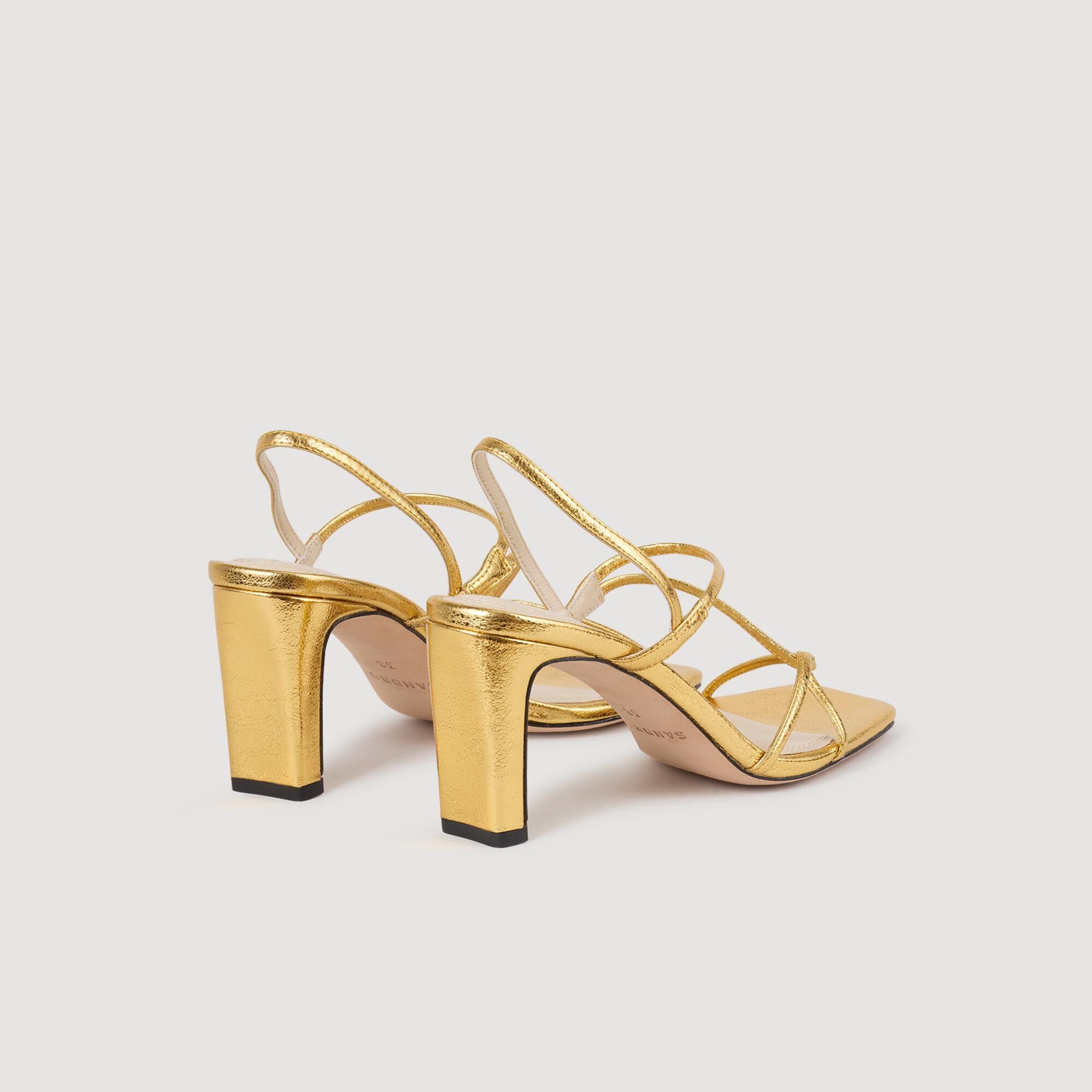 Sandali in pelle goffrata