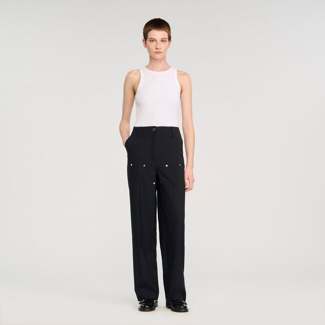 Pantaloni fluidi con rivetti