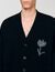 Cardigan con fiore
