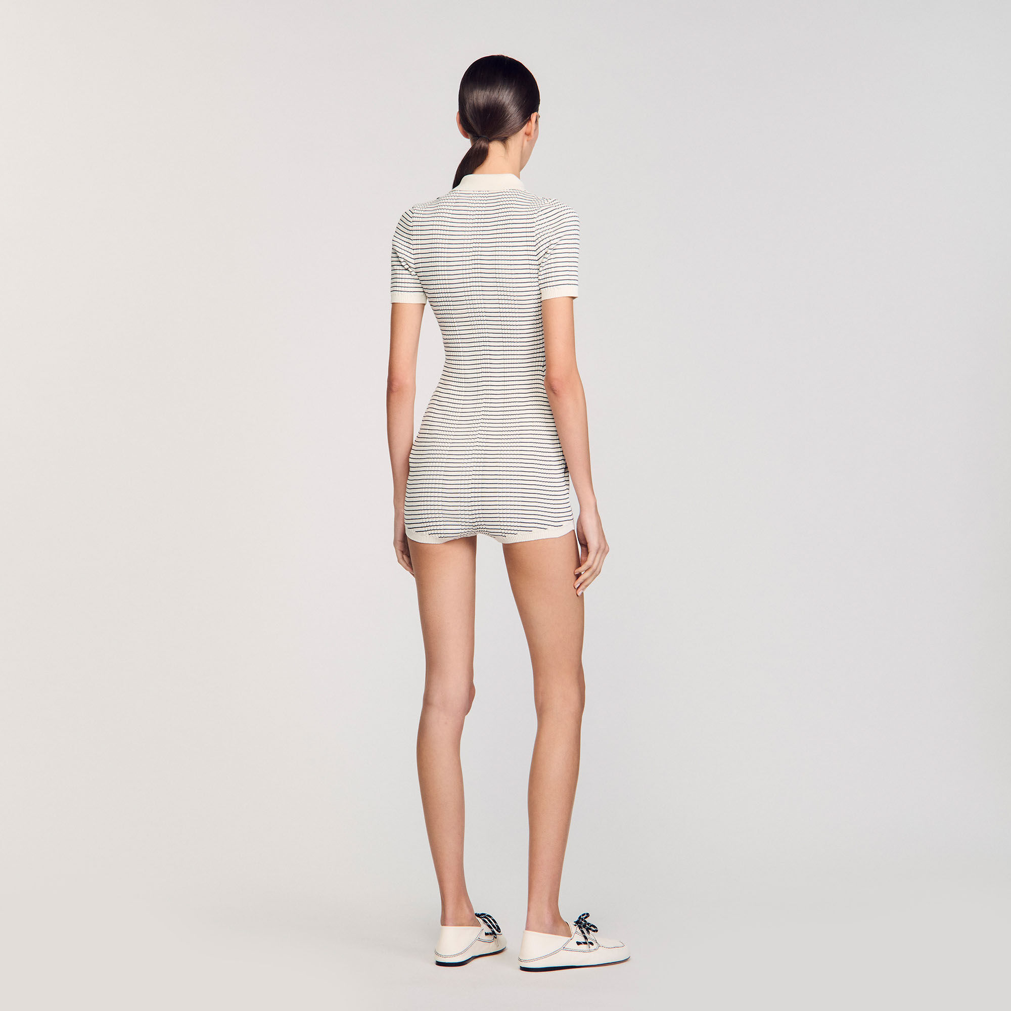 Tutina jumpsuit in maglia a righe