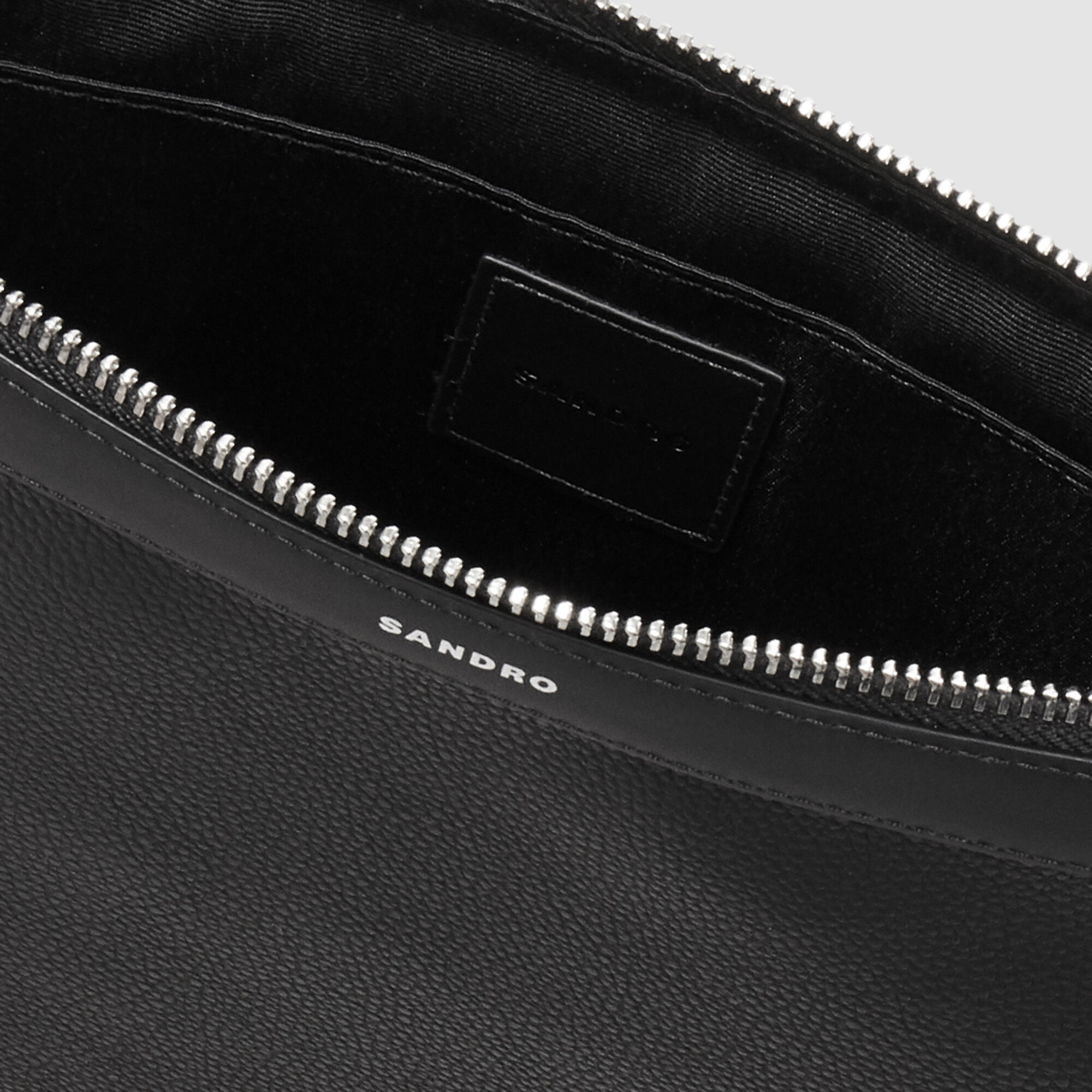 Pochette con zip in tela rivestita