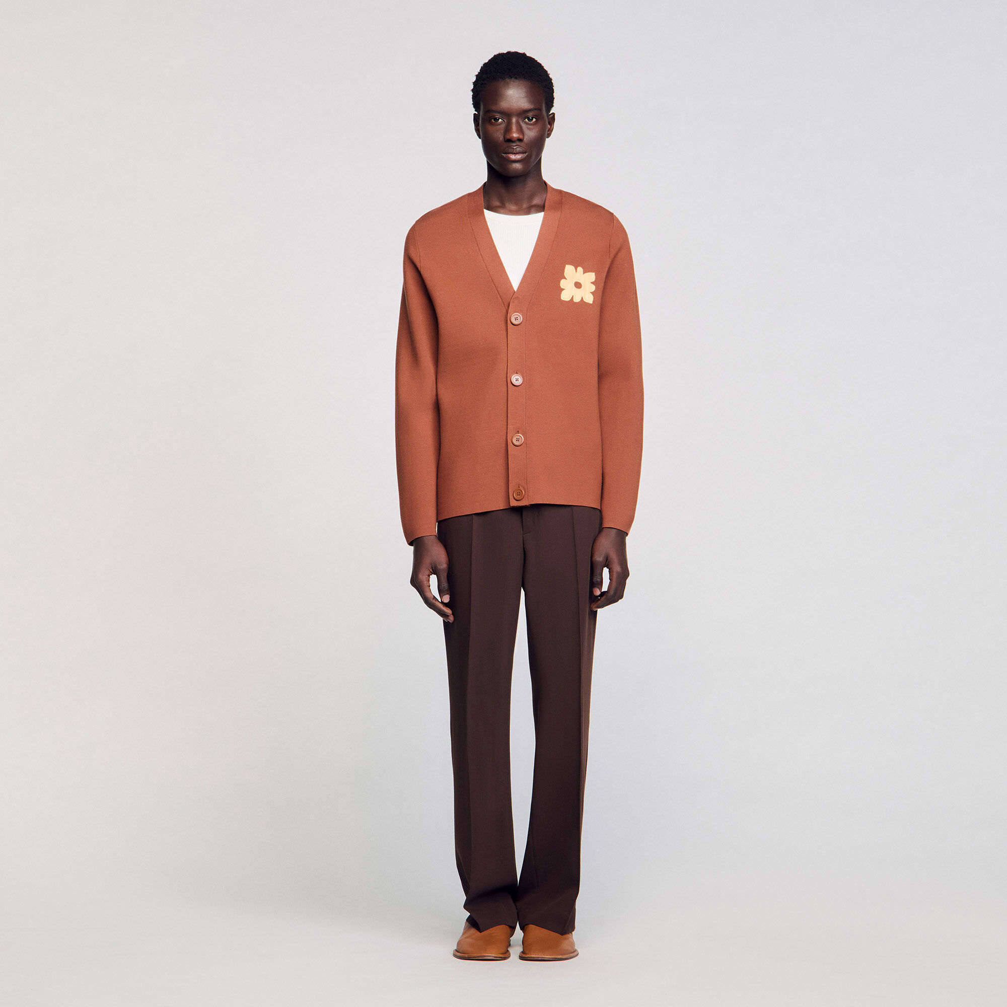 Cardigan con dettaglio a fiore