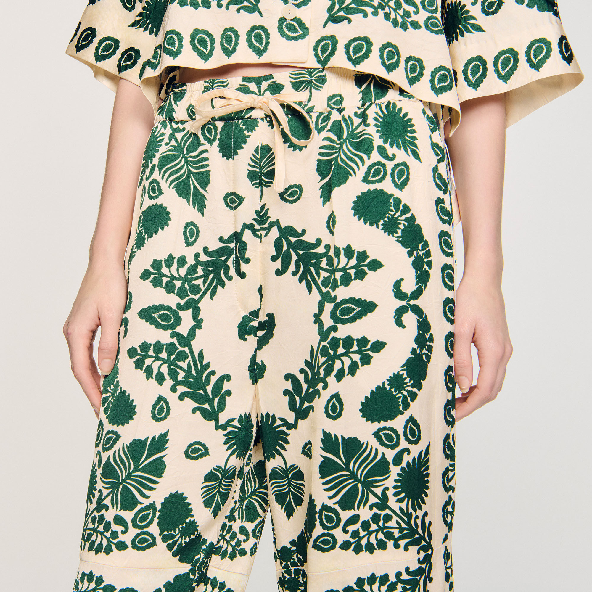 Pantaloni con stampa a fiori