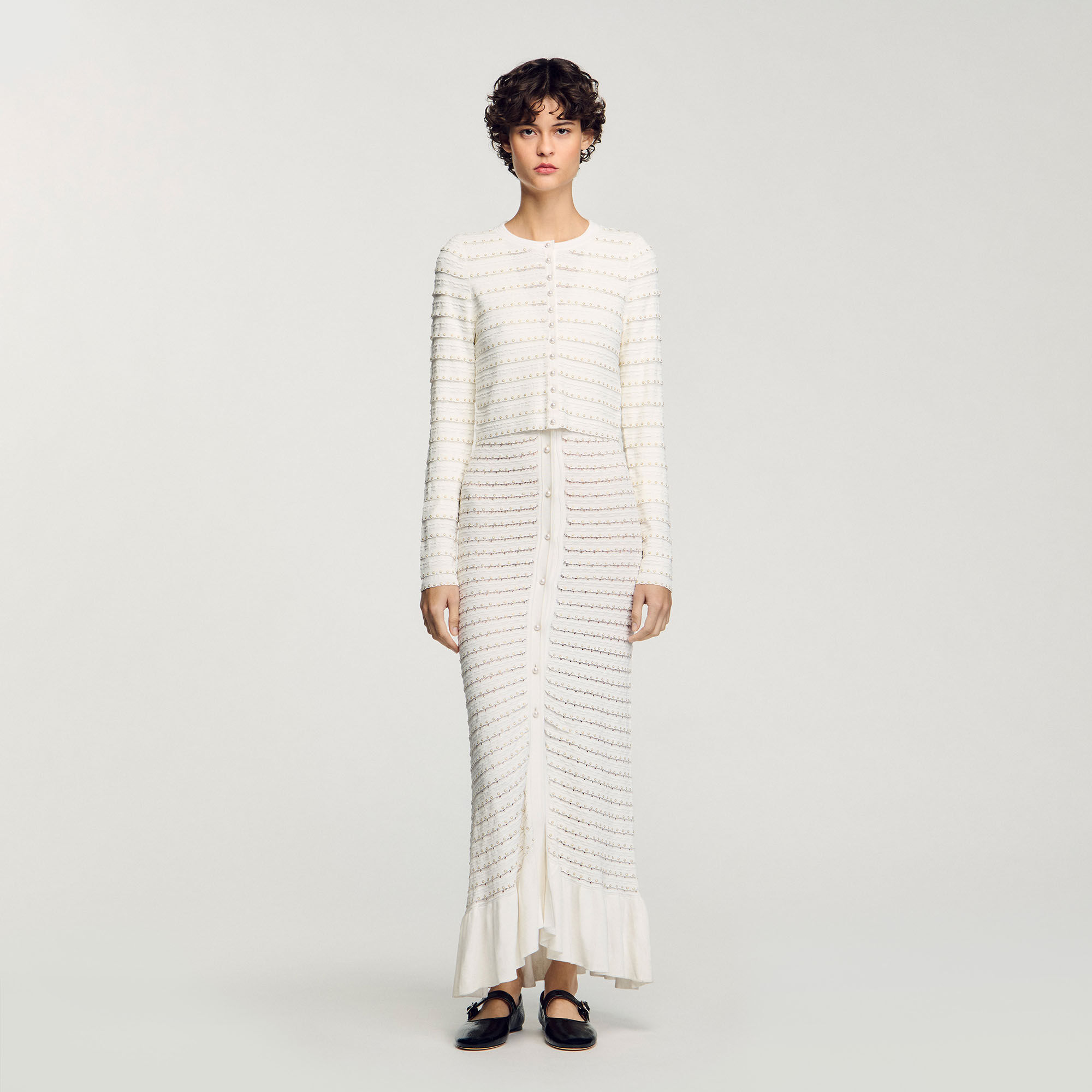 Cardigan corto con perline