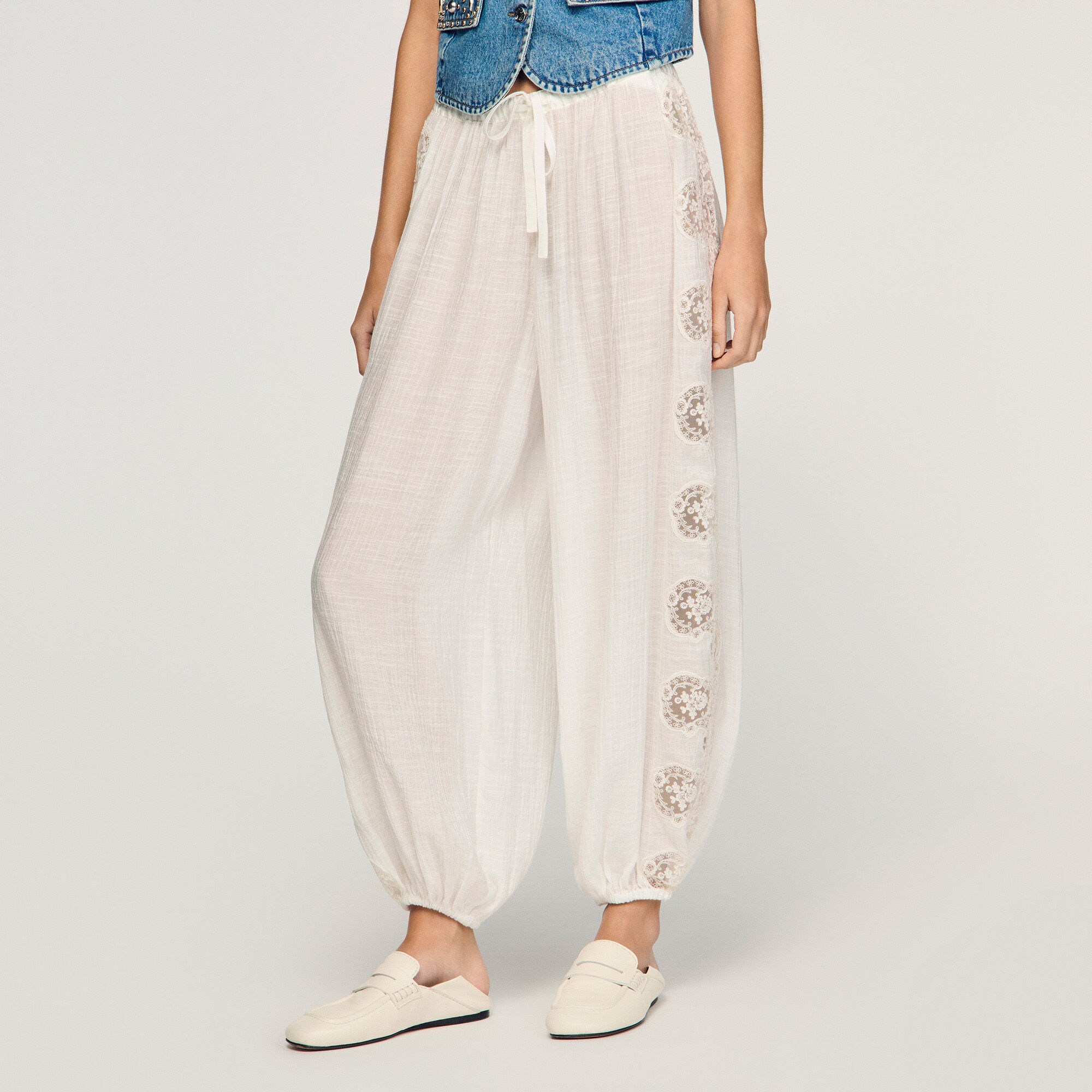 Pantaloni larghi in cr&eacute;pon