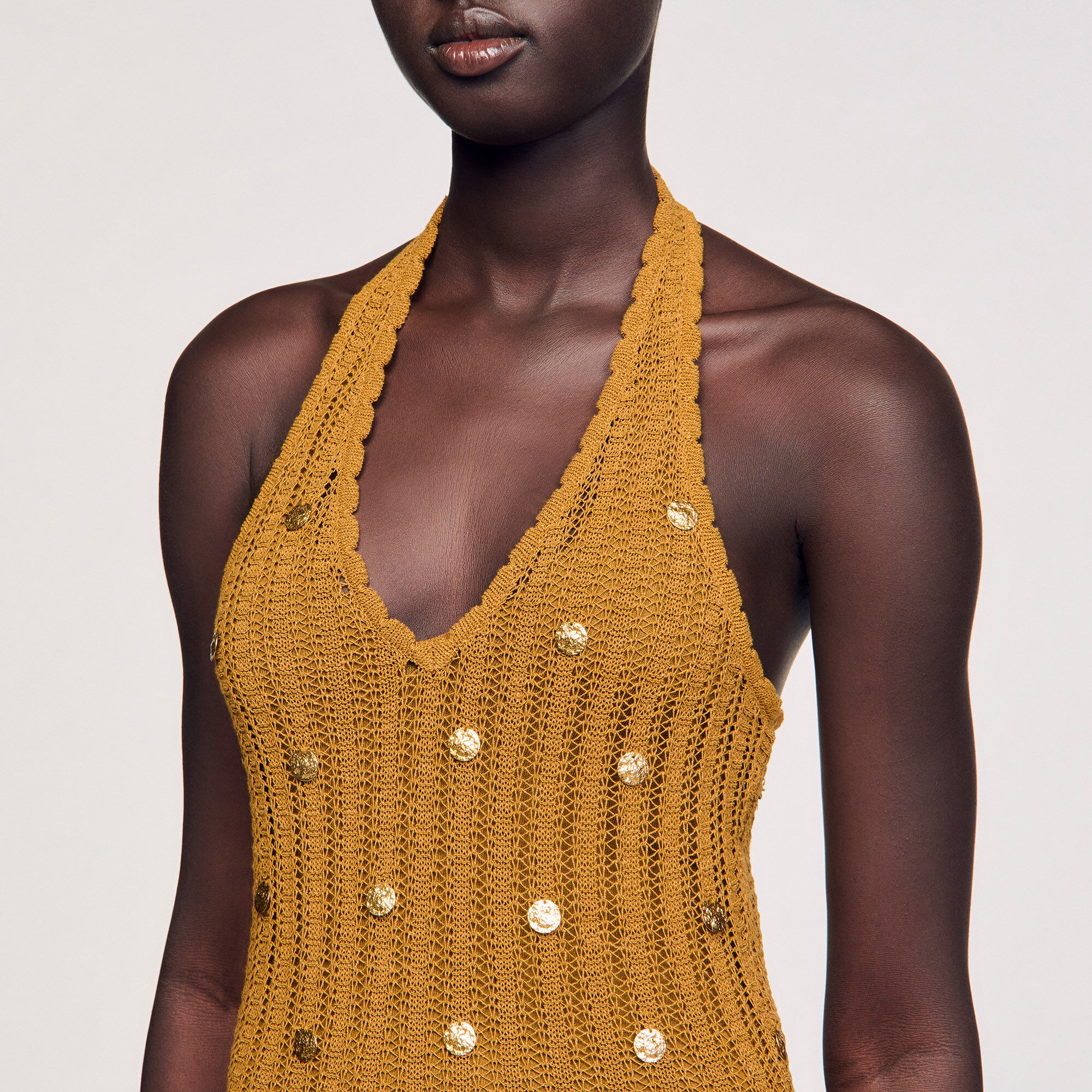 Abito lungo in maglia con frange