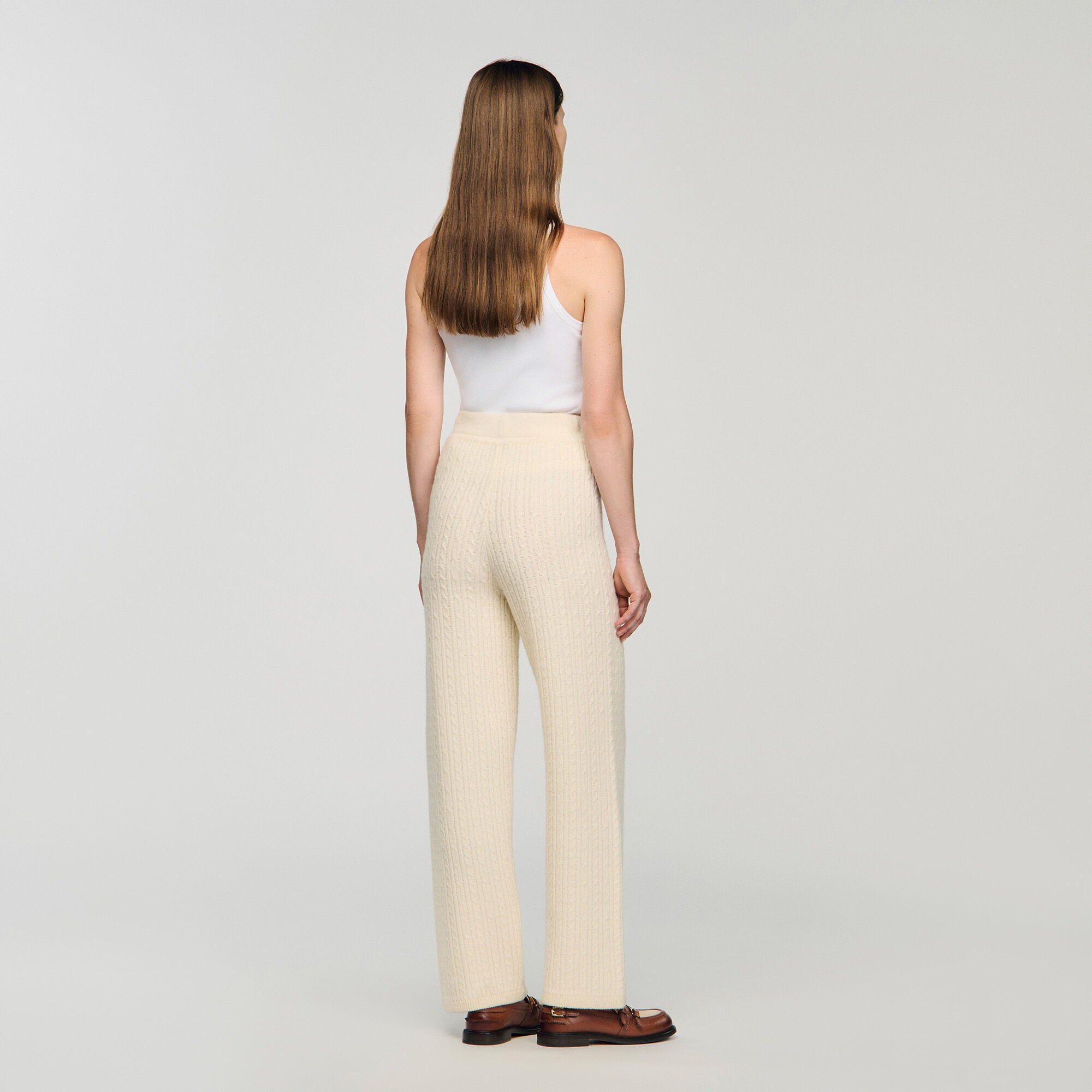 Pantaloni in maglia a trecce