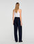 Pantaloni fluidi con rivetti