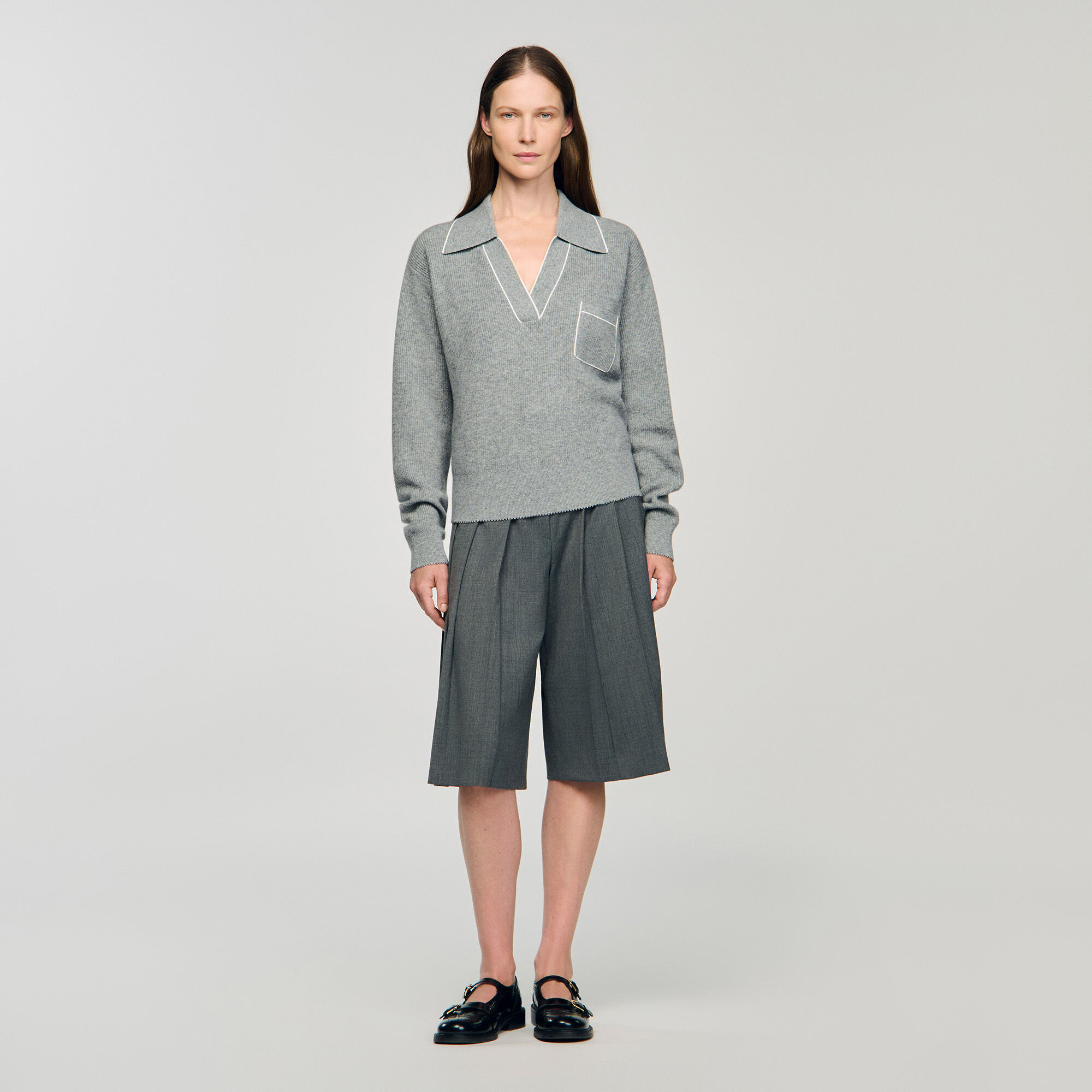 Maglione con colletto a polo aperto