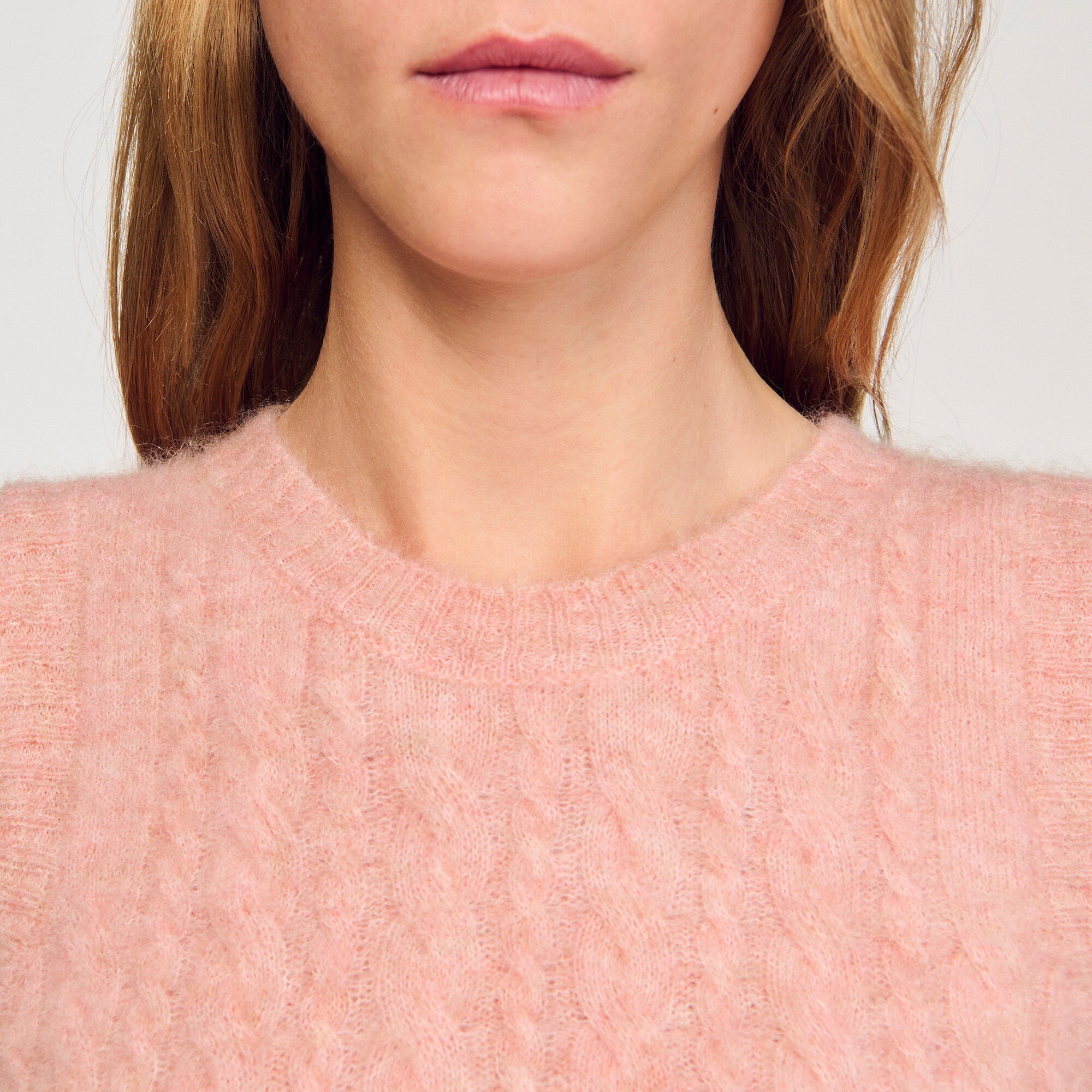 Maglione smanicato ritorto